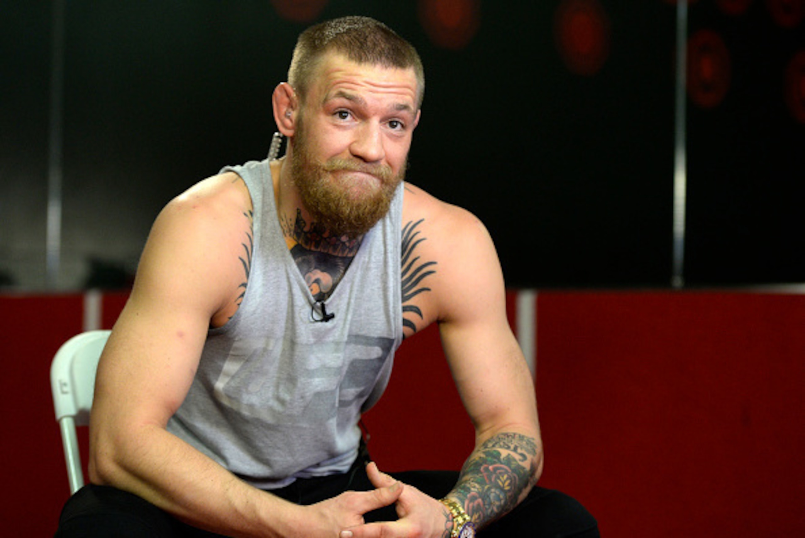 TORRENCE, CA - FEBRUARY 24:  UFC featherweight champion Conor McGregor speaks during an interview after a news conference with lightweight contender Nate Diaz at UFC Gym February 24, 2016, in Torrance, California. (Photo by Kevork Djansezian/Getty Images)