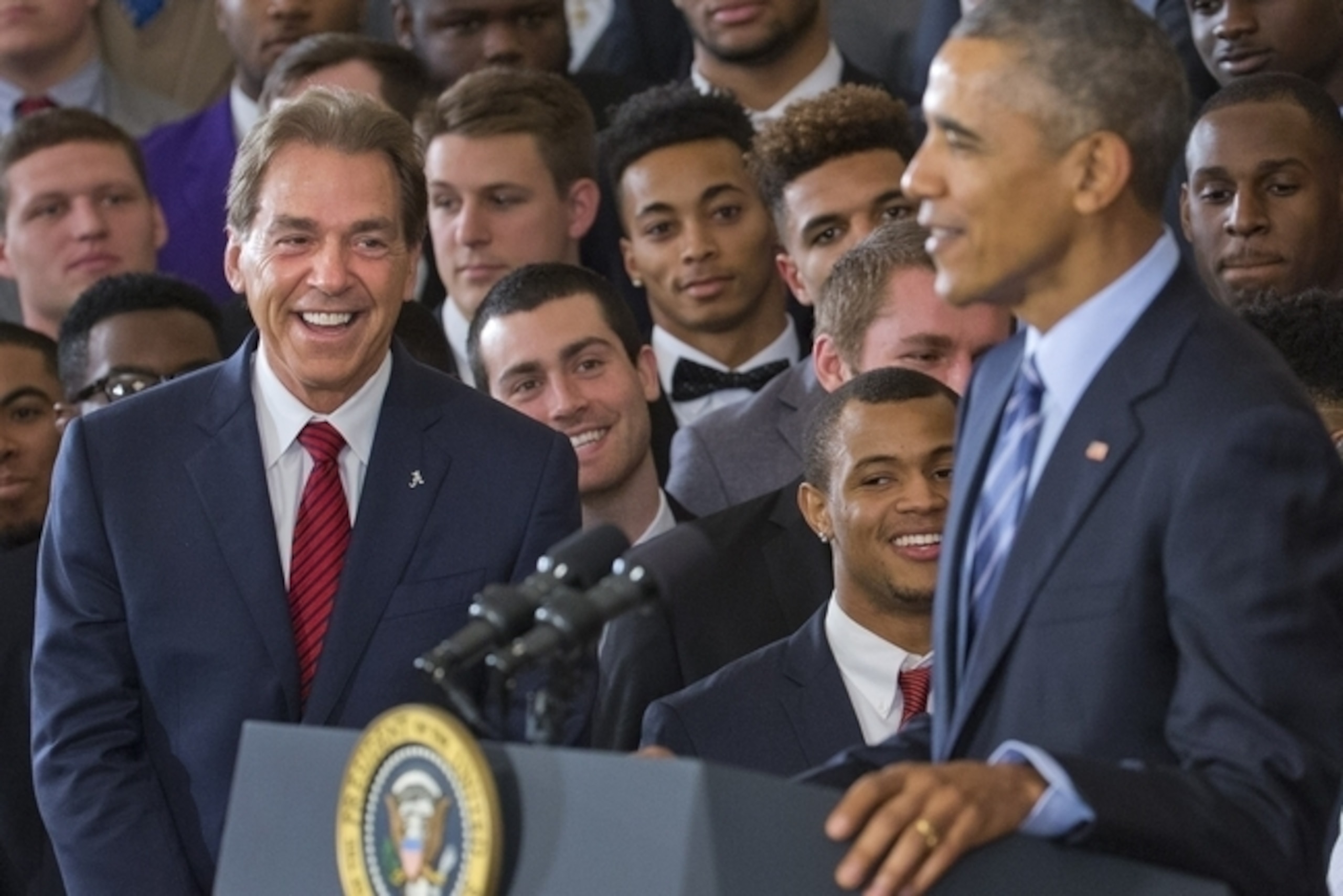 Alabama head coach Nick Saban (left) and President Barack Obama