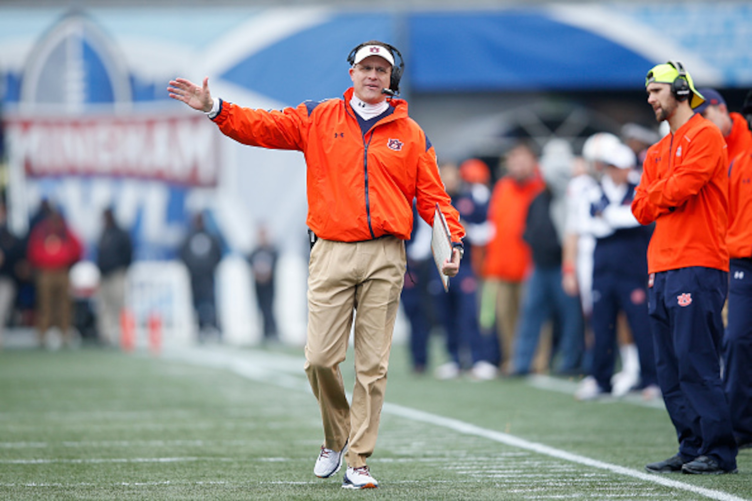 BIRMINGHAM, AL - DECEMBER 30: Head coach Gus Malzahn of the Auburn Tigers looks on against the Memphis Tigers during the Birmingham Bowl at Legion Field on December 30, 2015 in Birmingham, Alabama. Auburn defeated Memphis 31-10. (Photo by Joe Robbins/Gett