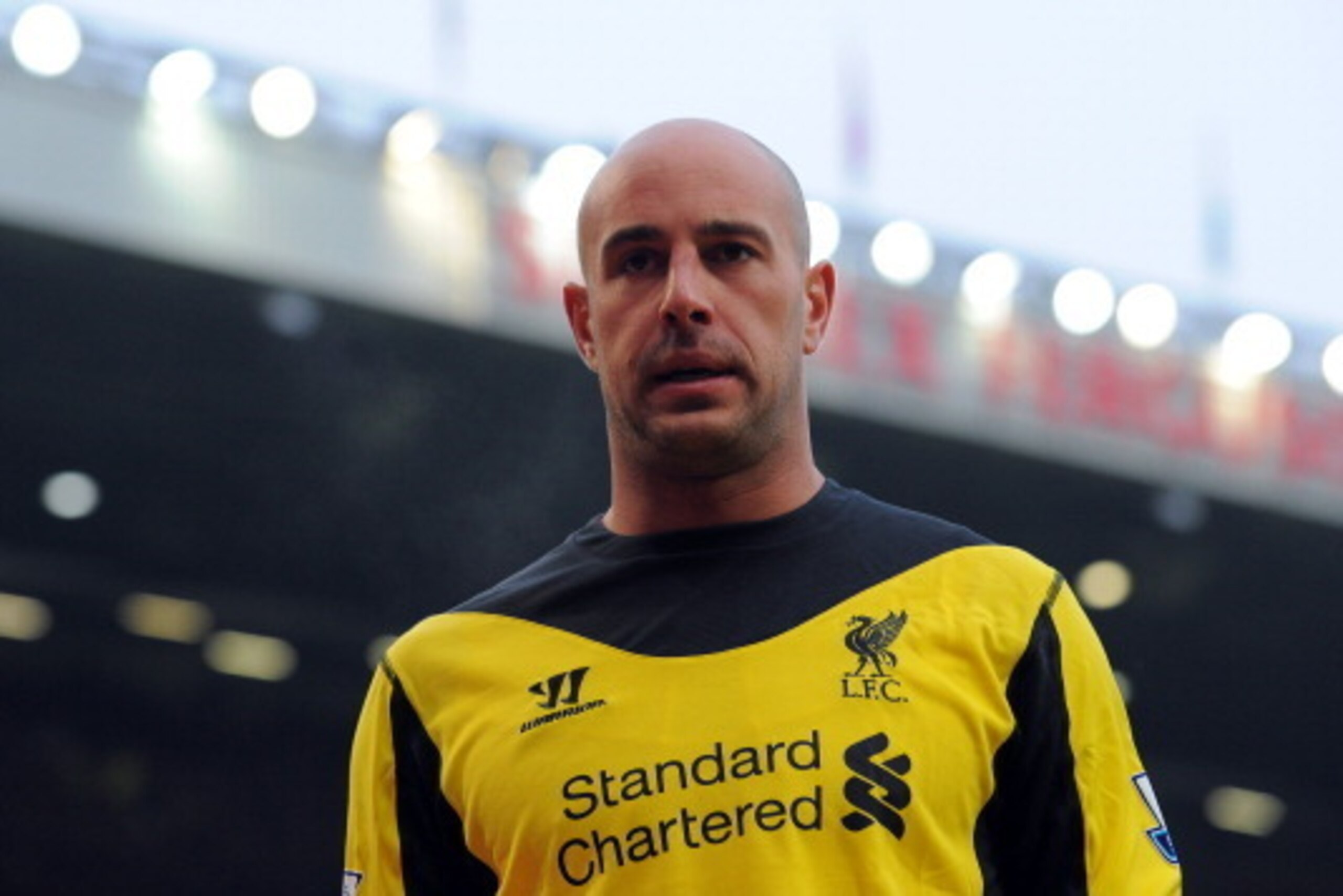 Liverpool's Spanish goalkeeper Pepe Reina plays during the English Premier League football match between Manchester United and Liverpool at Old Trafford in Manchester, northwest England, on January 13, 2013. United's second goal was awarded to Manchester 