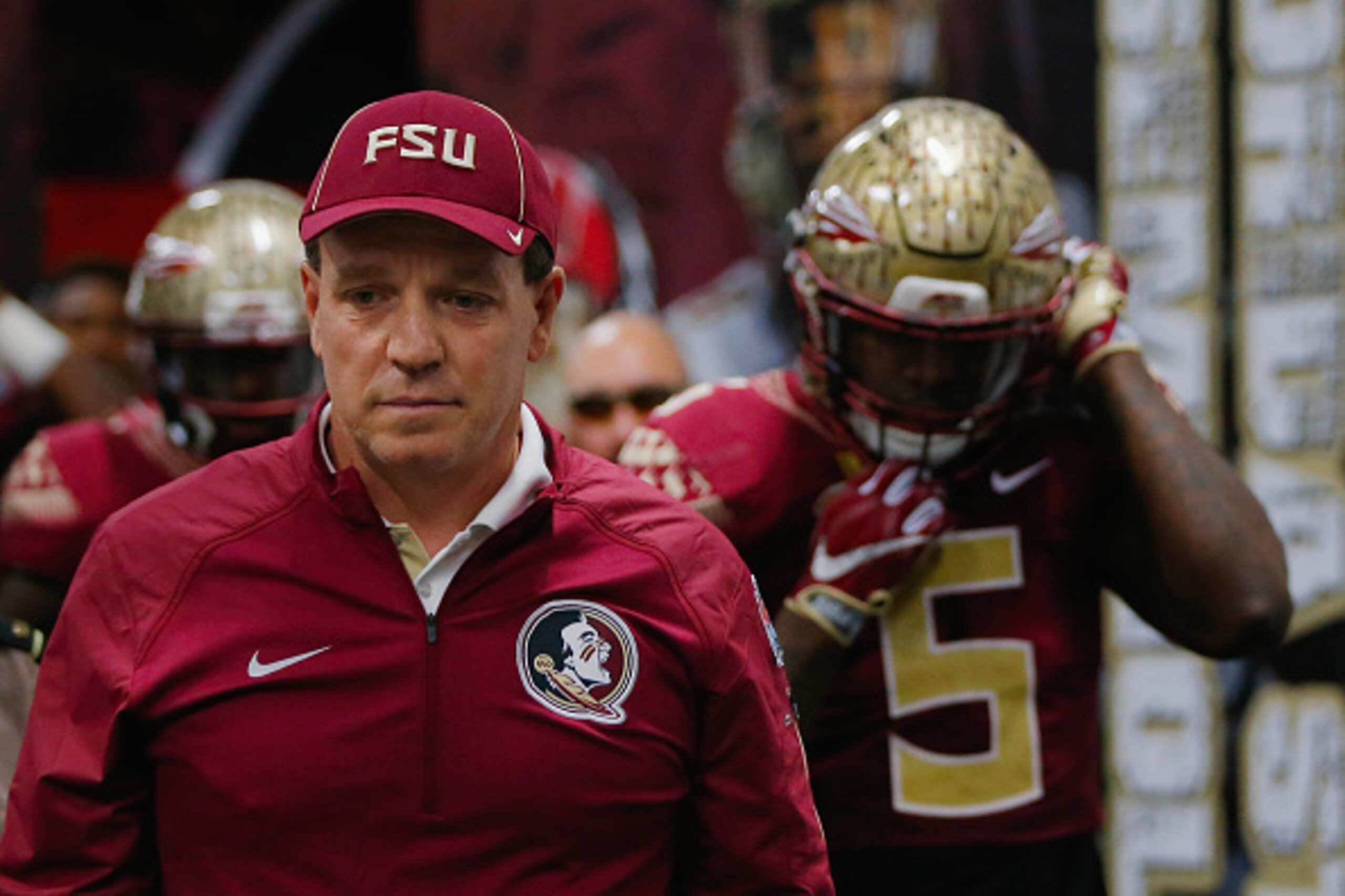 ATLANTA, GA - DECEMBER 31:  Head coach Jimbo Fisher of the Florida State Seminoles walks to the field before the game against the Houston Cougars during the Chick-fil-A Peach Bowl at the Georgia Dome on December 31, 2015 in Atlanta, Georgia.  (Photo by Ke