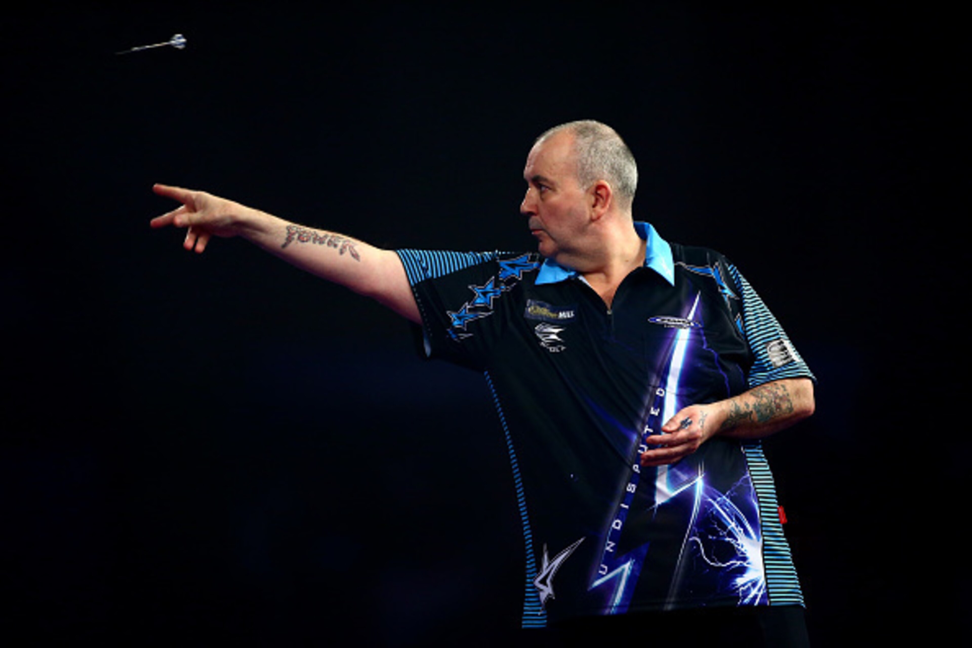 LONDON, ENGLAND - DECEMBER 30:  Phil Taylor of England in action in his third round match against Jelle Klaasen of the Netherlands on Day Twelve of the 2016 William Hill PDC World Darts Championships at Alexandra Palace on December 30, 2015 in London, Eng