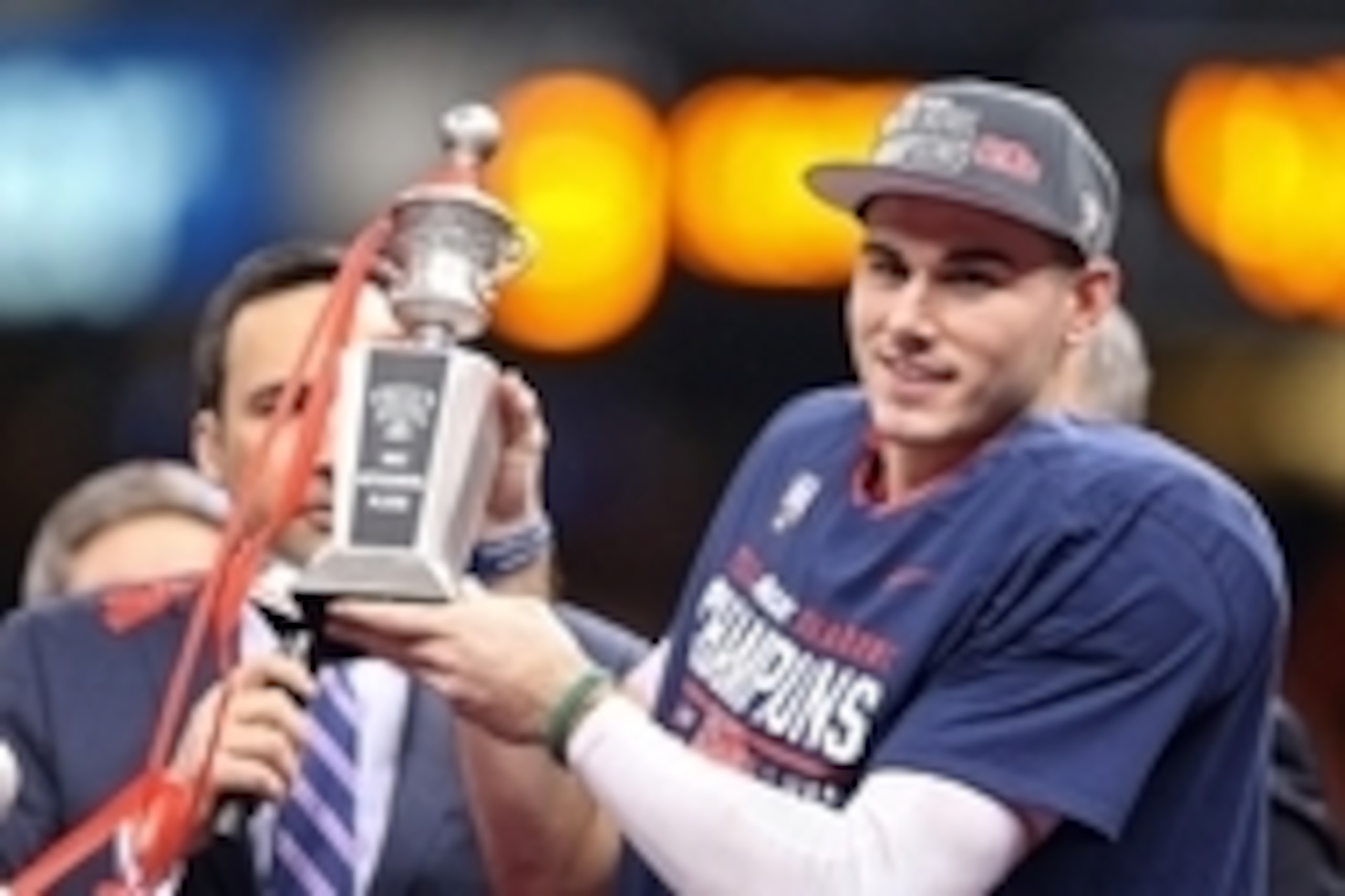 Jan 1, 2016; New Orleans, LA, USA; Mississippi Rebels quarterback Chad Kelly (10) accepts the trophy after being named MVP of the 2016 Sugar Bowl at the Mercedes-Benz Superdome. Mississippi defeated the Oklahoma State Cowboys, 48-20. Mandatory Credit: Chu