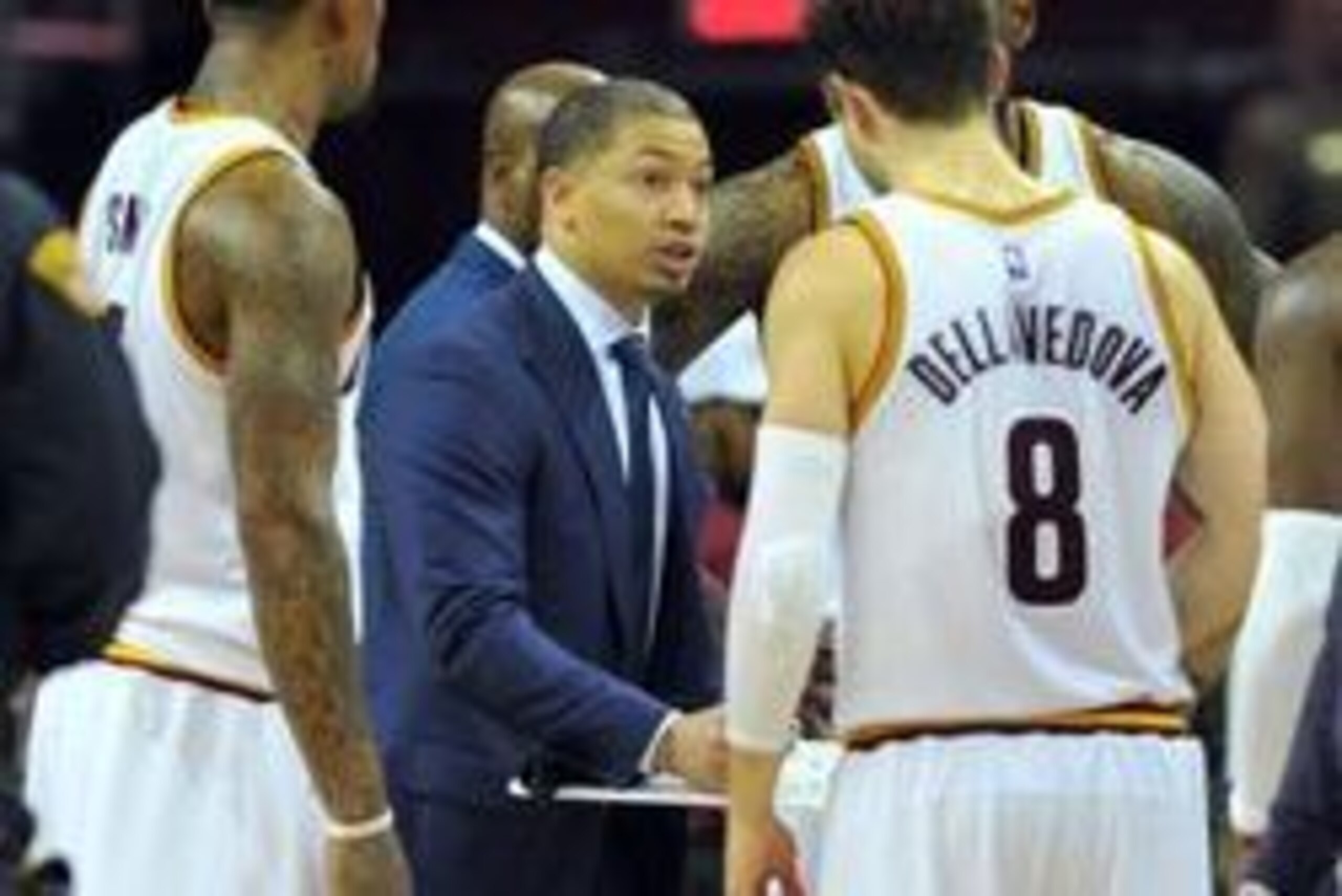 Jan 23, 2016; Cleveland, OH, USA; Cleveland Cavaliers head coach Tyronn Lue (C) huddles with his team during the fourth quarter against the Chicago Bulls at Quicken Loans Arena. The Bulls won 96-83. Mandatory Credit: Ken Blaze-USA TODAY Sports