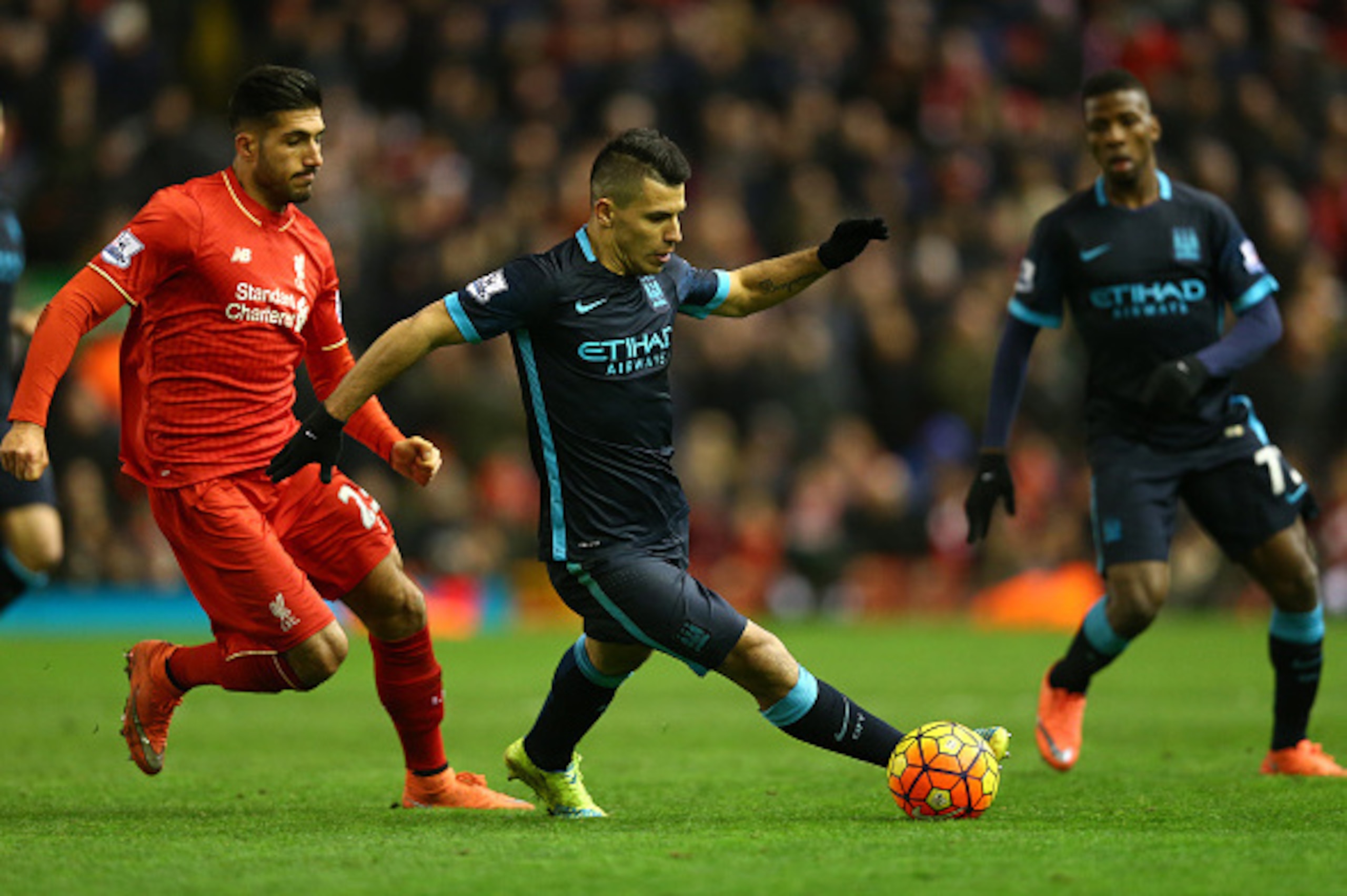 LIVERPOOL, ENGLAND - MARCH 02:  Emre Can of Liverpool challenges Sergio Aguero of Manchester City  during the Barclays Premier League match between Liverpool and Manchester City at Anfield on March 2, 2016 in Liverpool, England.  (Photo by Clive Brunskill