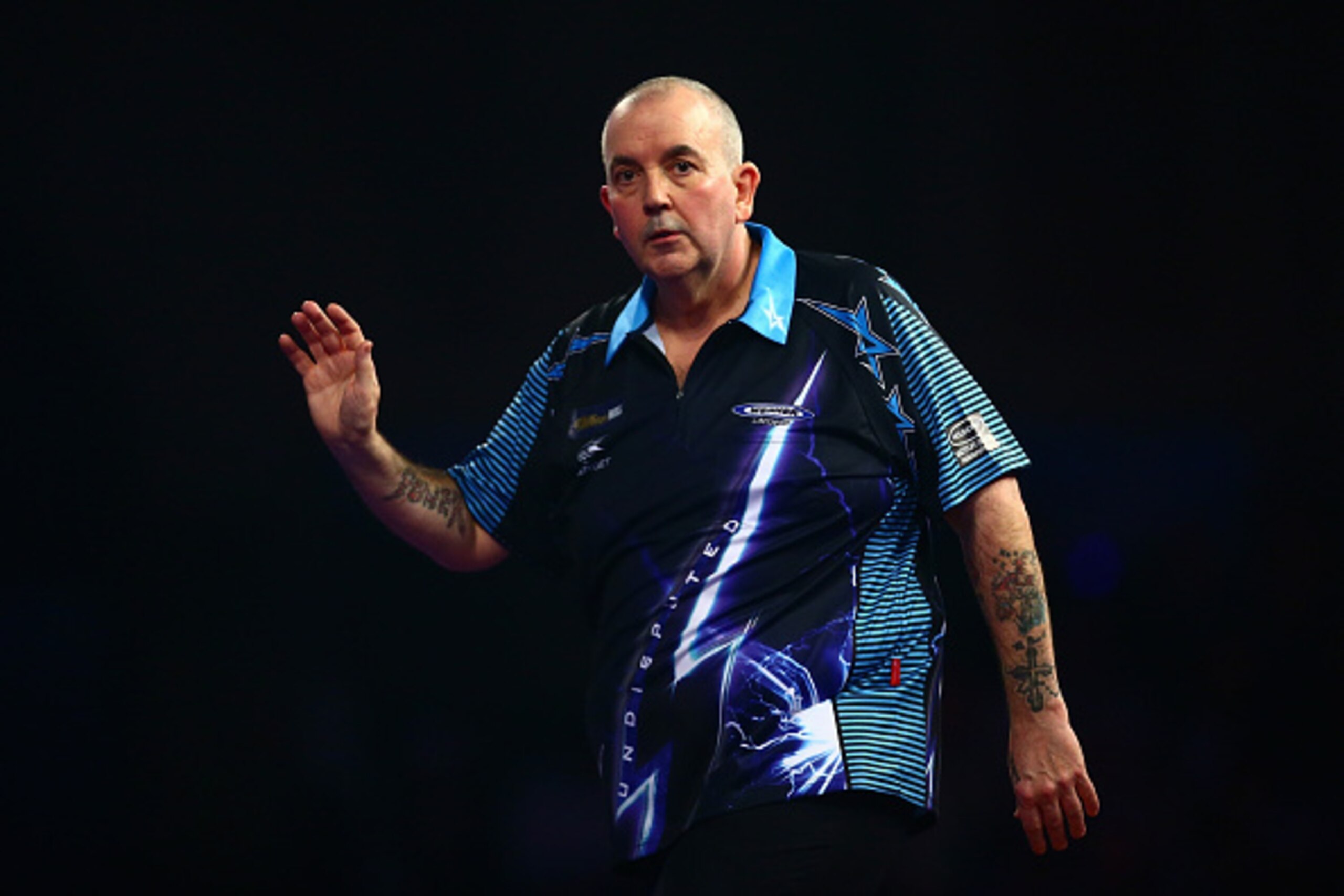 LONDON, ENGLAND - DECEMBER 30: Phil Taylor of England looks dejected in his third round match against Jelle Klaasen of the Netherlands on Day Twelve of the 2016 William Hill PDC World Darts Championships at Alexandra Palace on December 30, 2015 in London LONDON, ENGLAND - DECEMBER 30: Phil Taylor of England looks dejected in his third round match against Jelle Klaasen of the Netherlands on Day Twelve of the 2016 William Hill PDC World Darts Championships at Alexandra Palace on December 30, 2015 in London