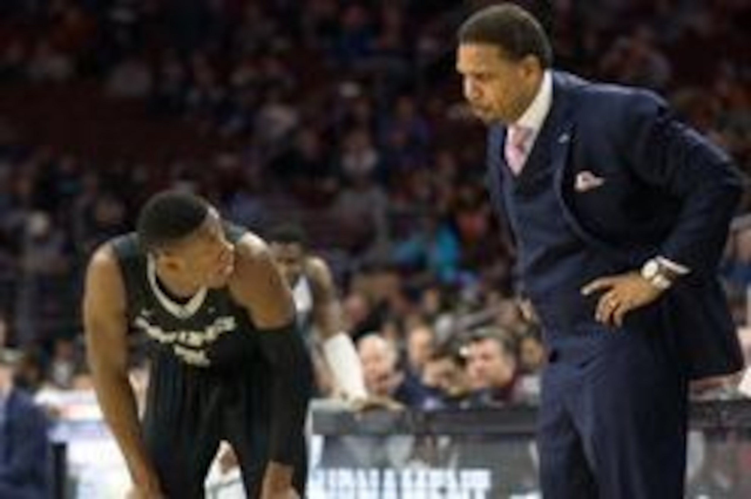 Jan 24, 2016; Villanova, PA, USA; Providence Friars head coach Ed Cooley talks with guard Kris Dunn (3) during the second half against the Villanova Wildcats at Wells Fargo Center. The Providence Friars won 82-76 in overtime. Mandatory Credit: Bill Streic Jan 24, 2016; Villanova, PA, USA; Providence Friars head coach Ed Cooley talks with guard Kris Dunn (3) during the second half against the Villanova Wildcats at Wells Fargo Center. The Providence Friars won 82-76 in overtime. Mandatory Credit: Bill Streic