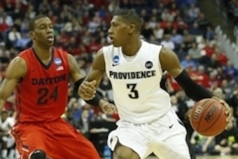 Mar 20, 2015; Columbus, OH, USA; Providence Friars guard Kris Dunn (3) dribbles while guarded by Dayton Flyers guard Jordan Sibert (24) during the first half in the second round of the 2015 NCAA Tournament at Nationwide Arena. Mandatory Credit: Greg Bartr