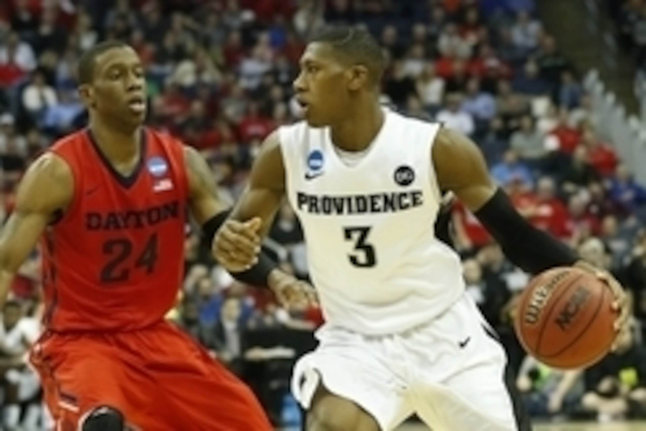 Mar 20, 2015; Columbus, OH, USA; Providence Friars guard Kris Dunn (3) dribbles while guarded by Dayton Flyers guard Jordan Sibert (24) during the first half in the second round of the 2015 NCAA Tournament at Nationwide Arena. Mandatory Credit: Greg Bartr Mar 20, 2015; Columbus, OH, USA; Providence Friars guard Kris Dunn (3) dribbles while guarded by Dayton Flyers guard Jordan Sibert (24) during the first half in the second round of the 2015 NCAA Tournament at Nationwide Arena. Mandatory Credit: Greg Bartr