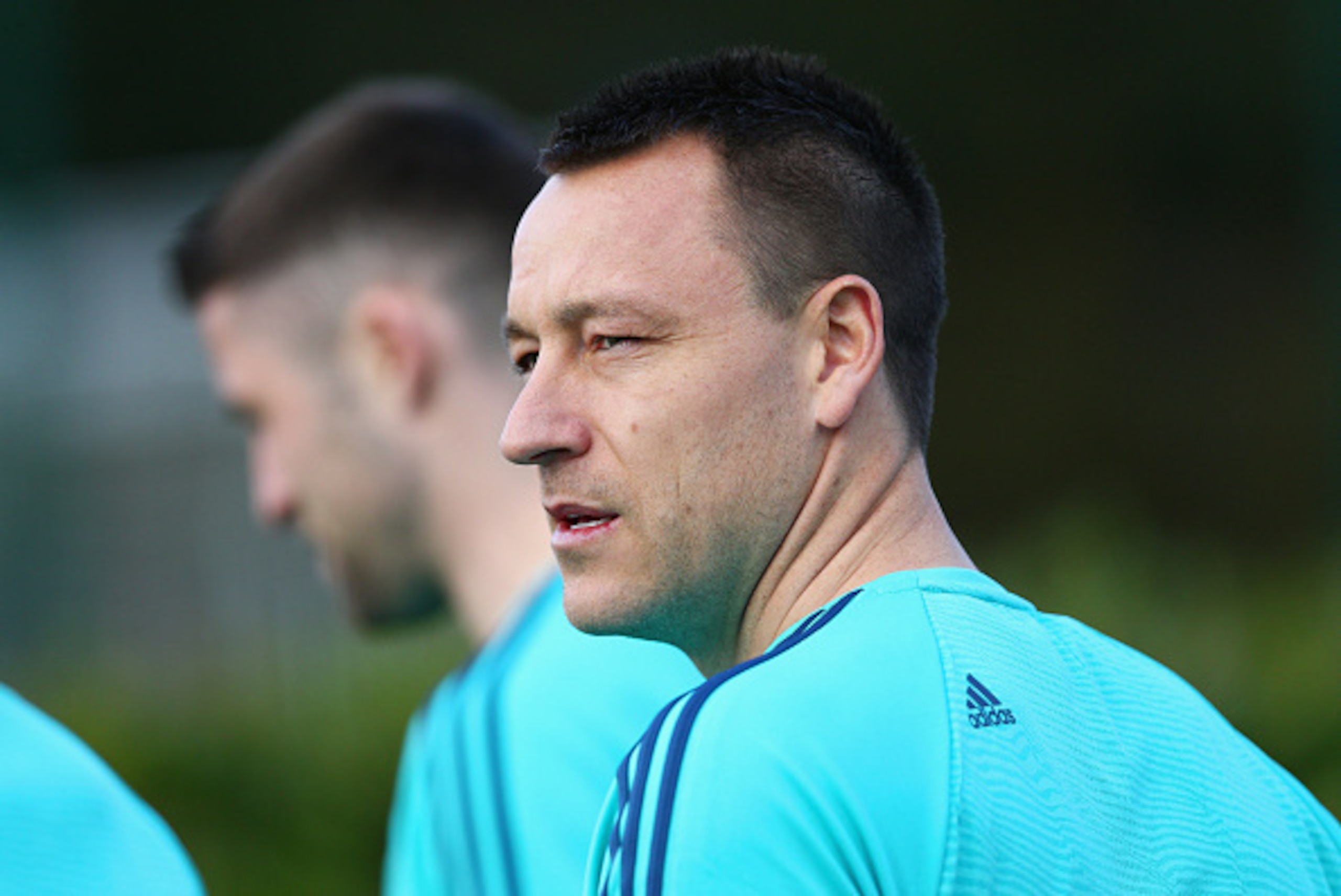COBHAM, ENGLAND - FEBRUARY 15: John Terry of Chelsea looks on during a Chelsea training session ahead of their UEFA Champions League round of 16 match against Paris Saint-Germain at Chelsea Training Ground on February 15, 2016 in Cobham, England. (Photo COBHAM, ENGLAND - FEBRUARY 15: John Terry of Chelsea looks on during a Chelsea training session ahead of their UEFA Champions League round of 16 match against Paris Saint-Germain at Chelsea Training Ground on February 15, 2016 in Cobham, England. (Photo