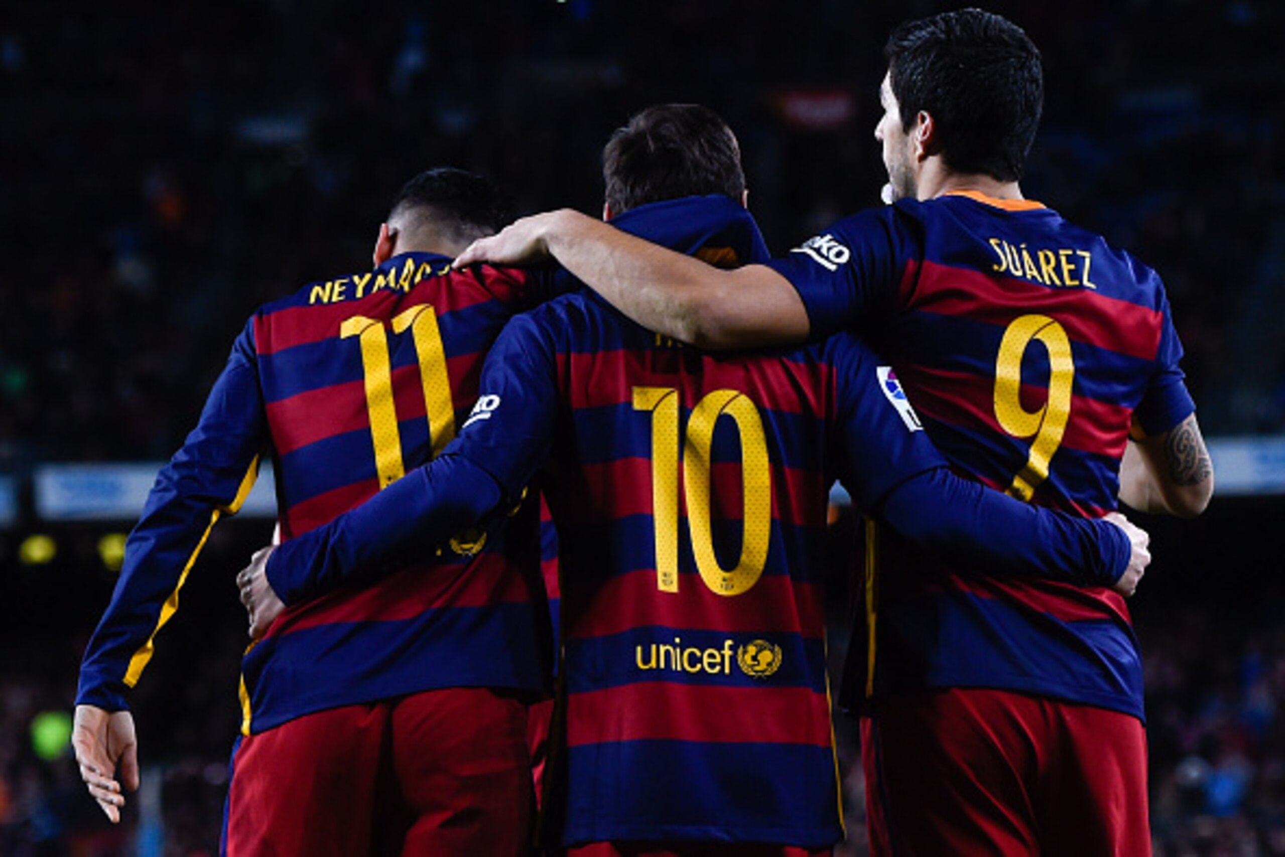 BARCELONA, SPAIN - FEBRUARY 14:  (R-L) Luis Suarez of FC Barcelona celebrates with his team mates Lionel Messi and Neymar of FC Barcelona after scoring his team's third goal during the La Liga match between FC Barcelona and Celta Vigo at Camp Nou on Febru