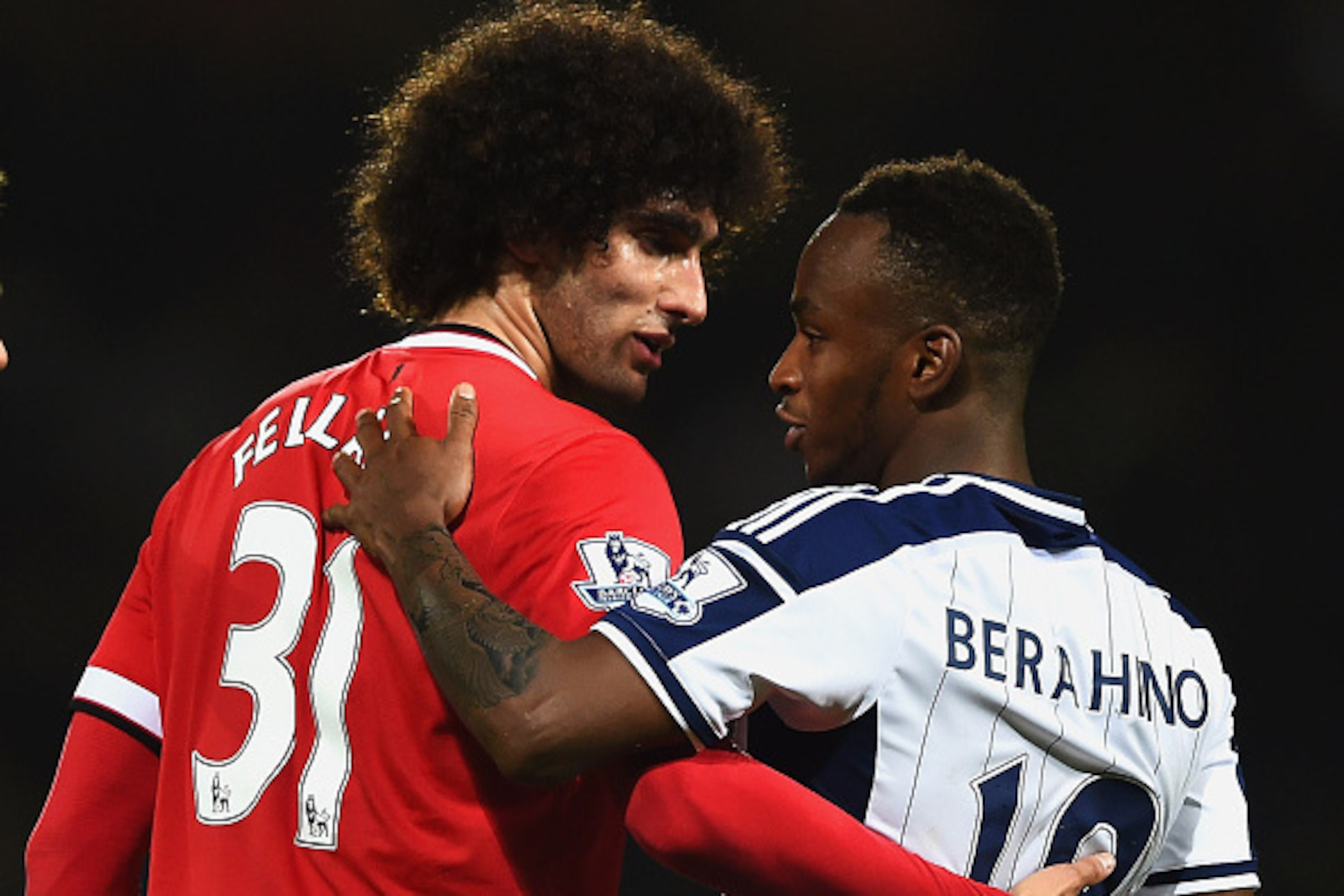 WEST BROMWICH, ENGLAND - OCTOBER 20:  Marouane Fellaini of Manchester United and Saido Berahino of West Bromwich Albion in discussion during the Barclays Premier League match between West Bromwich Albion and Manchester United at The Hawthorns on October 2