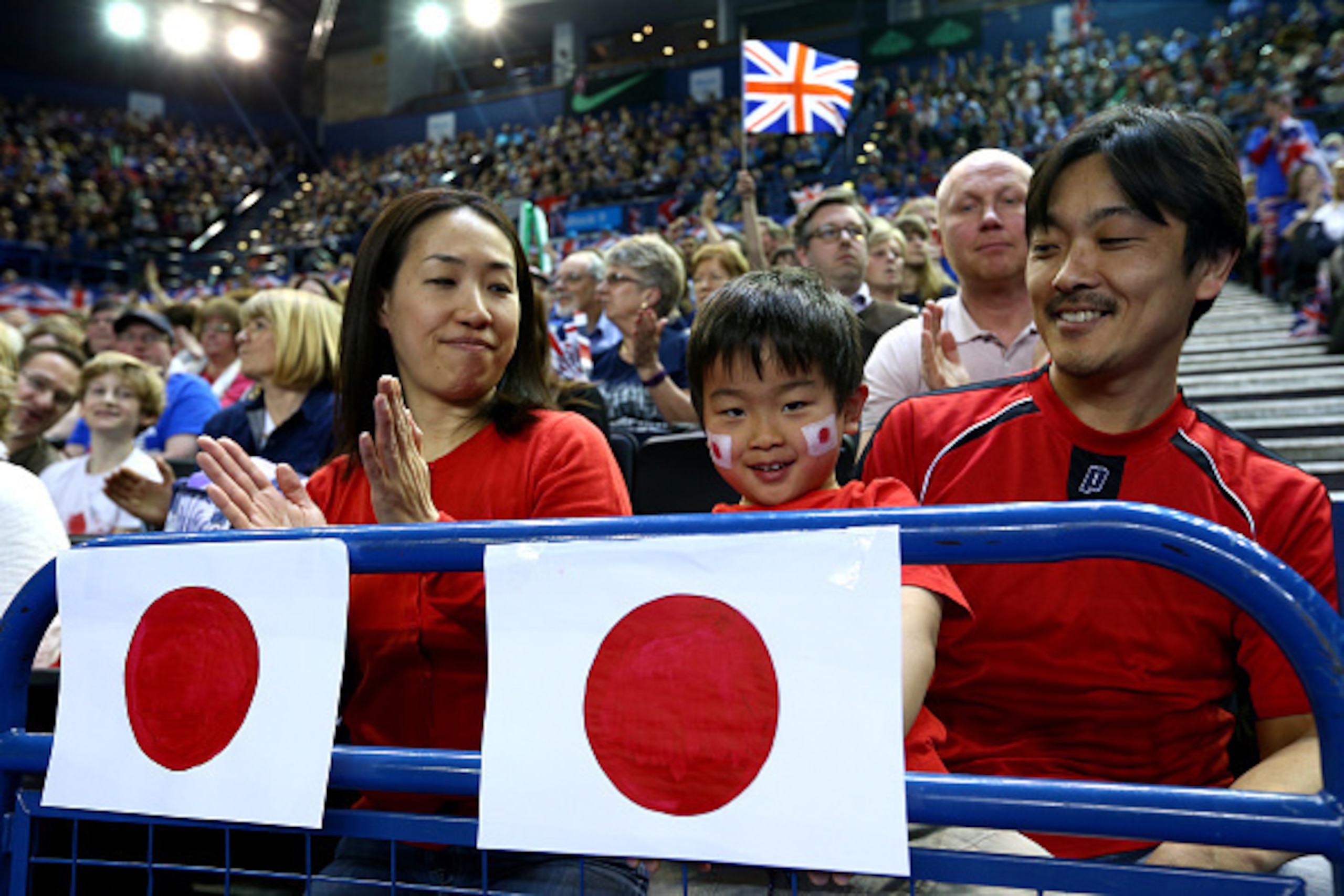BIRMINGHAM, ENGLAND - MARCH 05:  Japan fans watch Andy Murray and Jamie Murray of Great Britain in action in the doubles match against Yasutaka Uchiyama and Yoshihito Nishioka of Japan on day two of the Davis Cup World Group 1st round tie between Great Br