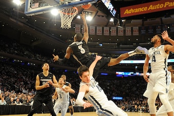 NEW YORK, NY - MARCH 13:  Kris Dunn #3 of the Providence Friars drives to the basket over during a semi-final game of the Big East basketball tournament against the Villanova Wildcats at Madison Square Garden on March 13, 2015 in New York City.  The Wildc