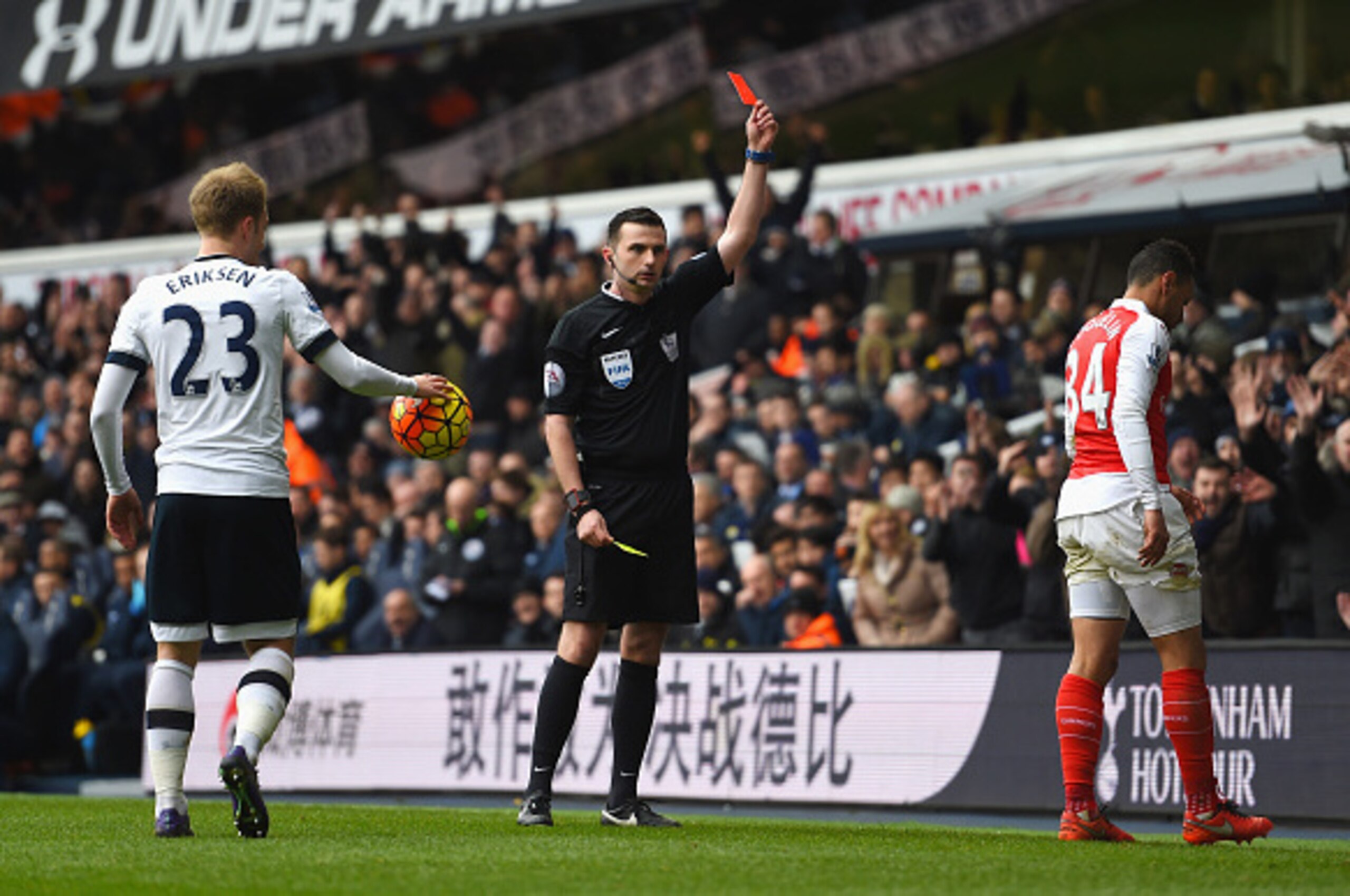 LONDON, ENGLAND - MARCH 05: Francis Coquelin (R) of Arsenal is shown a red card by referee Michael Oliver (C) during the Barclays Premier League match between Tottenham Hotspur and Arsenal at White Hart Lane on March 5, 2016 in London, England. (Photo LONDON, ENGLAND - MARCH 05: Francis Coquelin (R) of Arsenal is shown a red card by referee Michael Oliver (C) during the Barclays Premier League match between Tottenham Hotspur and Arsenal at White Hart Lane on March 5, 2016 in London, England. (Photo