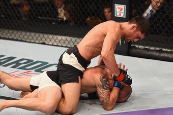 LAS VEGAS, NV - MARCH 05: Jason Saggo of Canada (top) punches Justin Salas in their lightweight bout during the UFC 196 event inside MGM Grand Garden Arena on March 5, 2016 in Las Vegas, Nevada.  (Photo by Josh Hedges/Zuffa LLC/Zuffa LLC via Getty Images)
