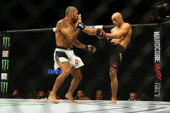 LAS VEGAS, NV - MARCH 5:   Vitor Miranda (R) kicks Marcelo Guimaraes at the MGM Grand Garden Arena on March 5, 2016 in Las Vegas, Nevada. (Photo by Rey Del Rio/Getty Images)