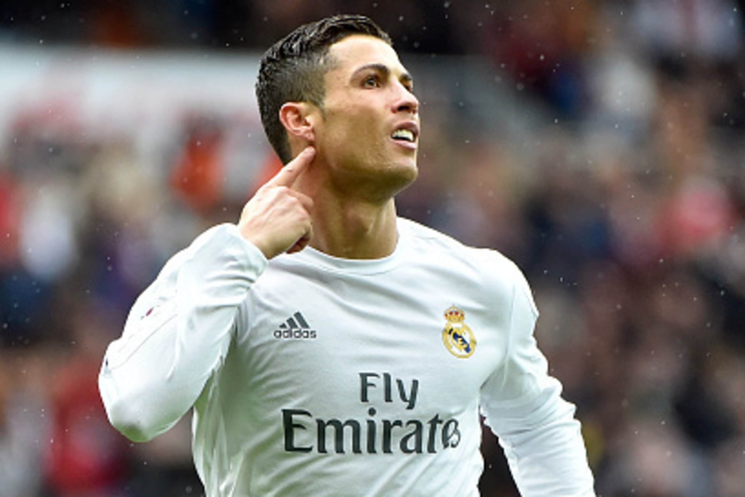 Portuguese forward Cristiano Ronaldo celebrates a goal during the Spanish league football match Real Madrid CF vs RC Celta de Vigo at the Santiago Bernabeu stadium in Madrid on March 5, 2016. / AFP / GERARD JULIEN        (Photo credit should read GERARD J