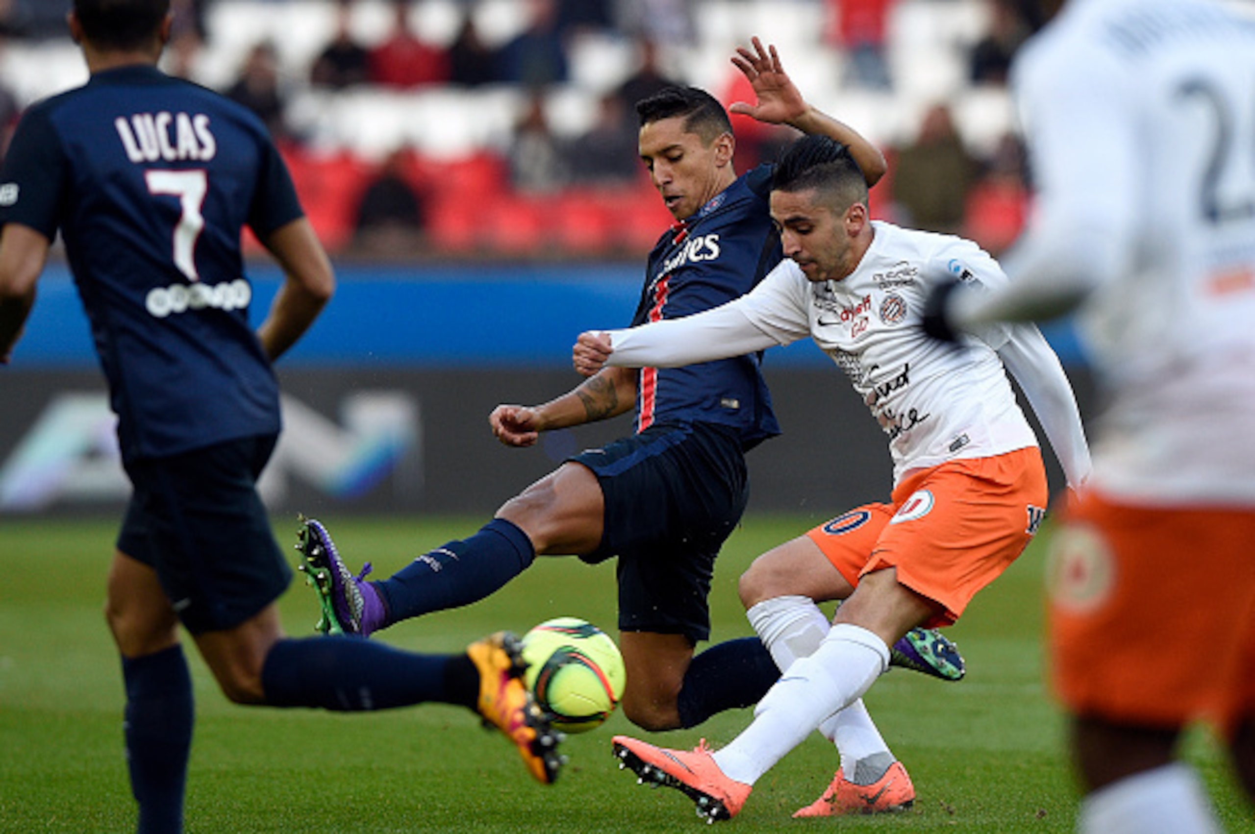 Paris Saint-Germain's Brazilian defender Marquinhos (L) vies for the ball with Montpellier's French forward Ryad Boudebouz (R) during the French L1 football match between Paris Saint-Germain (PSG) and Montpellier (MHSC) on March 5, 2016 at the Parc des Pr