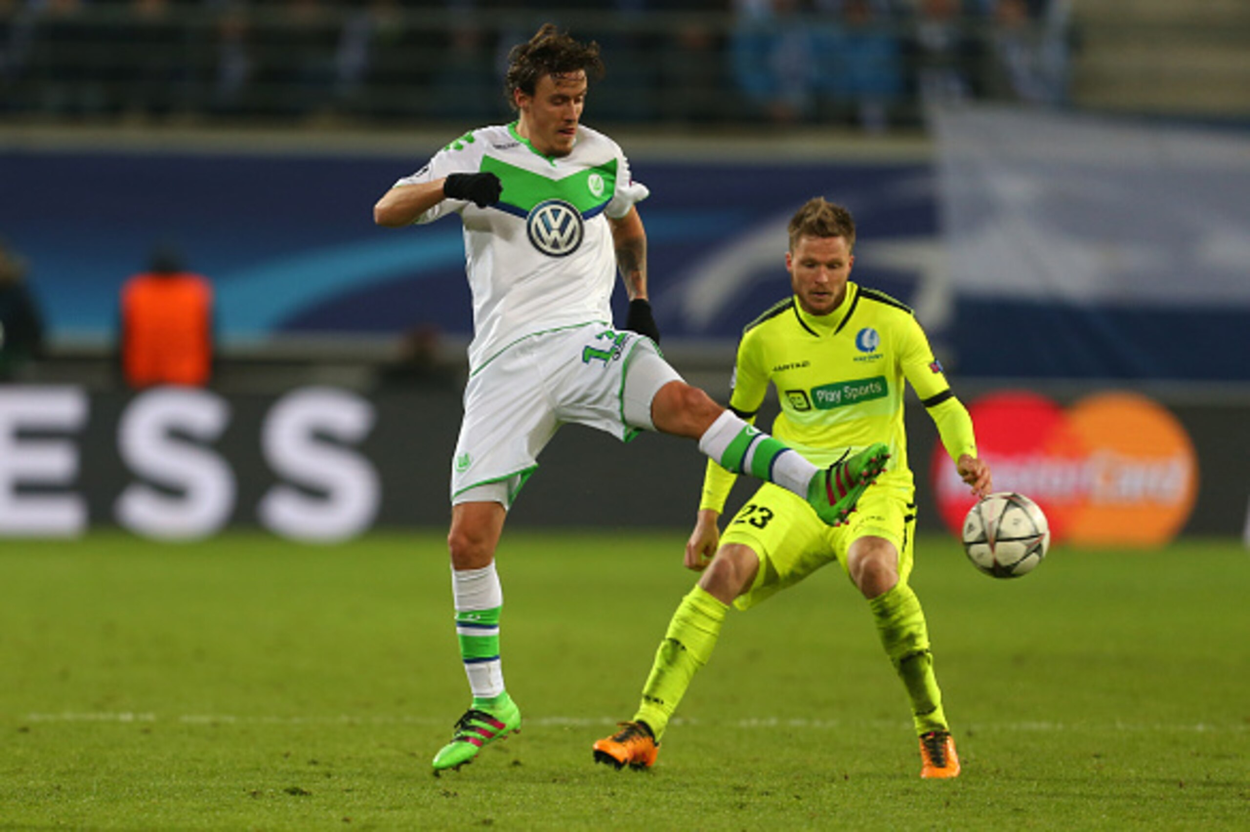 GENT, BELGIUM - FEBRUARY 17 : Max Kruse of Wolfsburg and Lasse Nielsen of Gent during the UEFA Champions League match between KAA Gent and VfL Wolfsburg at Ghelamco Arena, on February 17, 2016 in Gent, Belgium. (Photo by Catherine Ivill - AMA/Getty Images