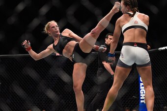 LAS VEGAS, NV - MARCH 05:  (L-R) Holly Holm kicks Miesha Tate during the UFC 196 event inside MGM Grand Garden Arena on March 5, 2016 in Las Vegas, Nevada.  (Photo by Jeff Bottari/Zuffa LLC/Zuffa LLC via Getty Images)
