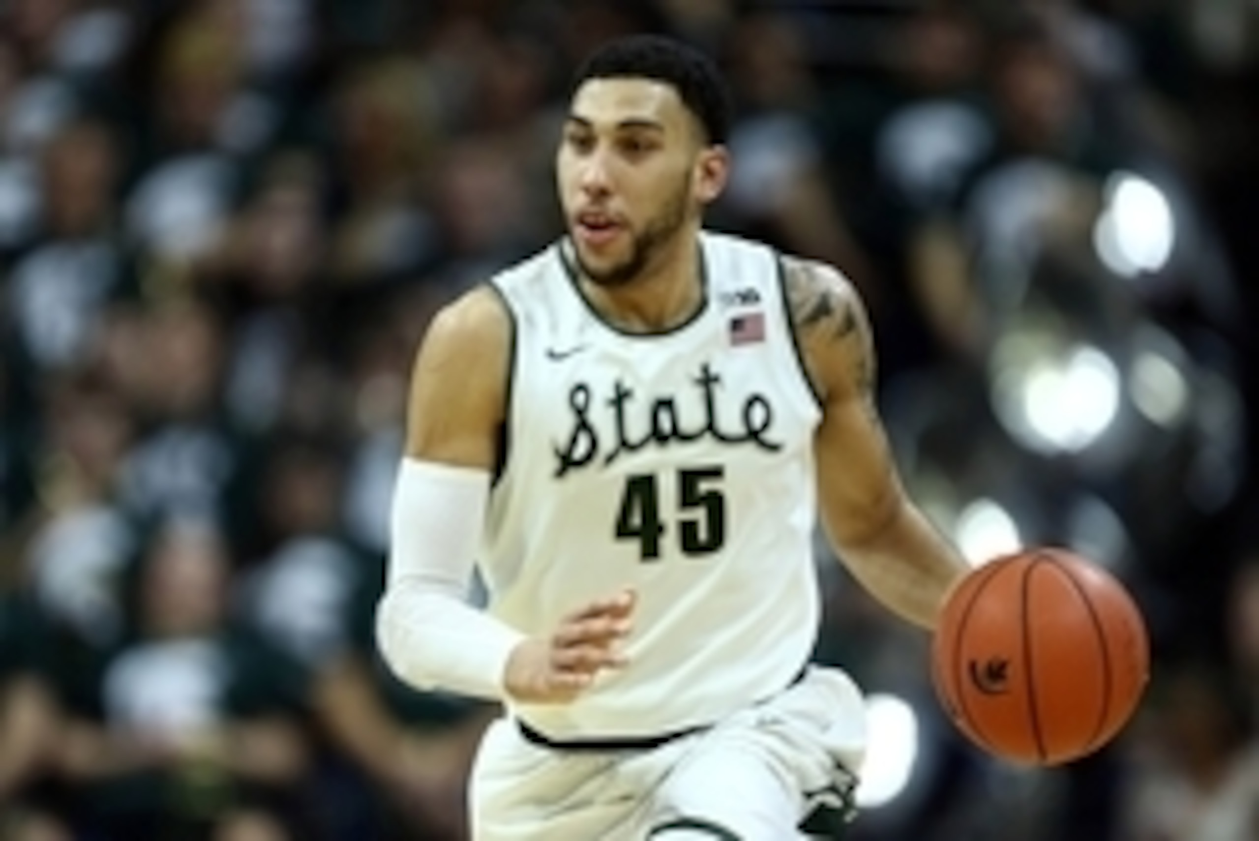 Feb 18, 2016; East Lansing, MI, USA; Michigan State Spartans guard Denzel Valentine (45) brings the ball up court during the second half of a game against the Wisconsin Badgers at Jack Breslin Student Events Center. Mandatory Credit: Mike Carter-USA TODAY