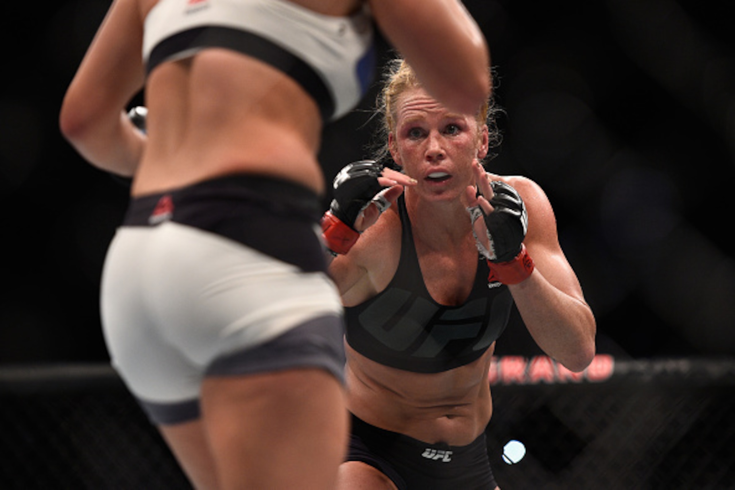 LAS VEGAS, NV - MARCH 05:  Holly Holm faces Miesha Tate during the UFC 196 event inside MGM Grand Garden Arena on March 5, 2016 in Las Vegas, Nevada.  (Photo by Jeff Bottari/Zuffa LLC/Zuffa LLC via Getty Images)