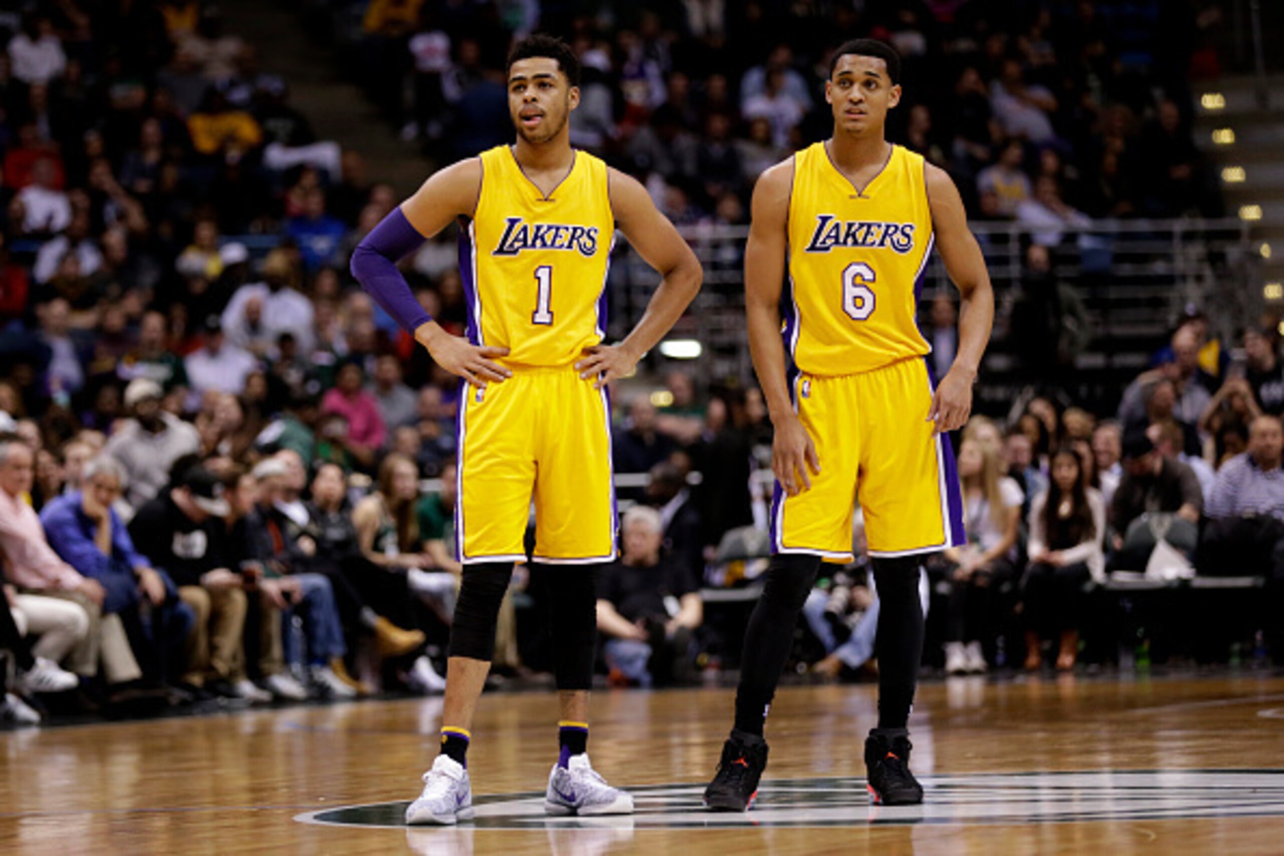MILWAUKEE, WI - FEBRUARY 22: D'Angelo Russell #1 of the Los Angeles Lakers and Jordan Clarkson #6 watch Kobe Bryant shoot a free throw during the game against the Milwaukee Bucks at BMO Harris Bradley Center on February 22, 2016 in Milwaukee, Wisconsin. N
