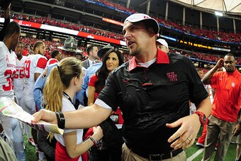 ATLANTA, GA - DECEMBER 31: Head Coach Tom Herman of the Houston Cougars celebrates after the Chick-Fil-A Peach Bowl against the Florida State Seminoles at the Georgia Dome on December 31, 2015 in Atlanta, Georgia. Photo by Scott Cunningham/Getty Images)
