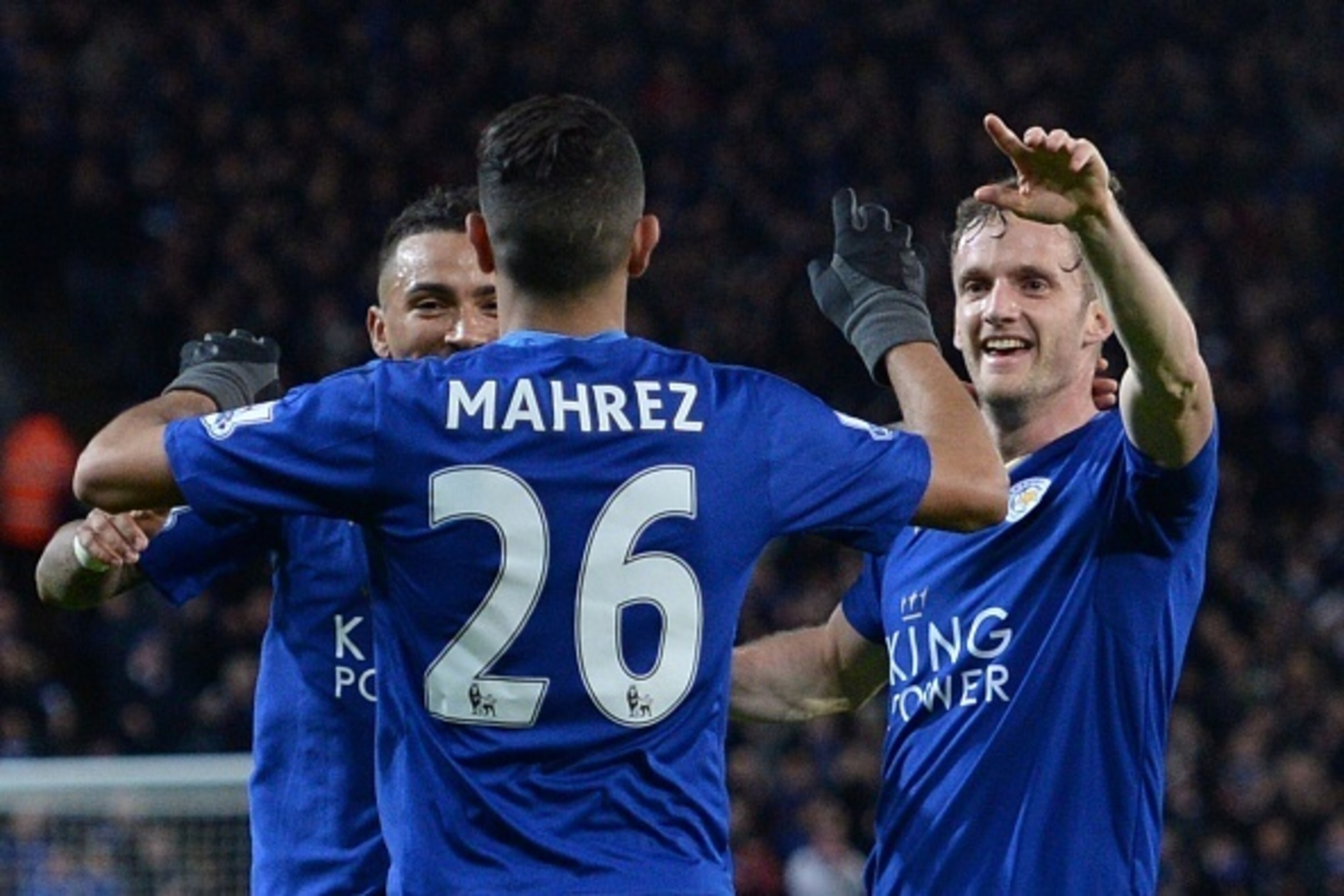 Leicester City's Welsh midfielder Andy King (R) celebrates scoring their second goal with Leicester City's Algerian midfielder Riyad Mahrez (C) during the English Premier League football match between Leicester City and West Bromwich Albion at the King Po Leicester City's Welsh midfielder Andy King (R) celebrates scoring their second goal with Leicester City's Algerian midfielder Riyad Mahrez (C) during the English Premier League football match between Leicester City and West Bromwich Albion at the King Po