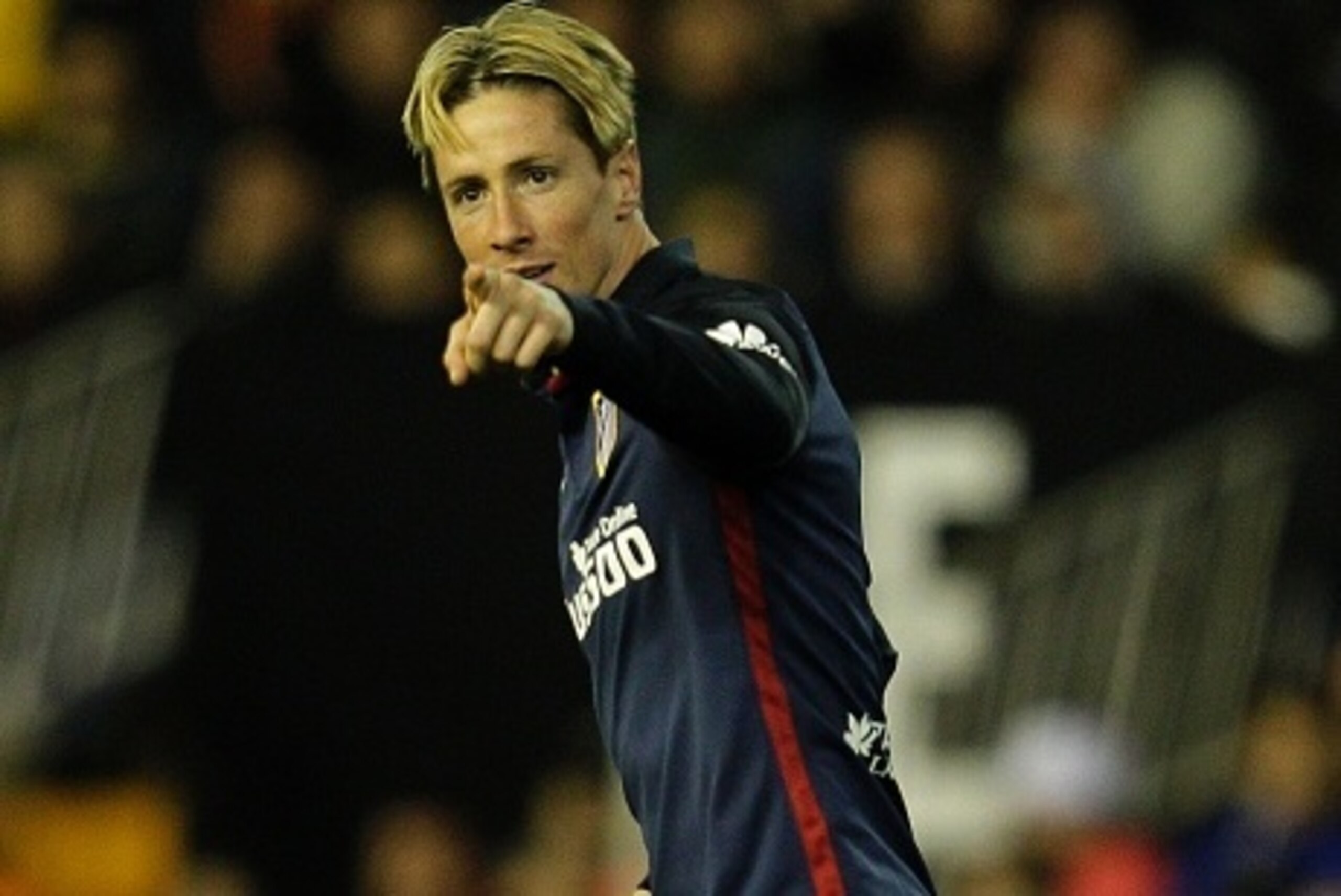 Atletico Madrid's forward Fernando Torres celebrates a goal during the Spanish league football match Valencia CF vs Club Atletico de Madrid at the Mestalla stadium in Valencia on March 6, 2016. / AFP / JOSE JORDAN (Photo credit should read JOSE JOR Atletico Madrid's forward Fernando Torres celebrates a goal during the Spanish league football match Valencia CF vs Club Atletico de Madrid at the Mestalla stadium in Valencia on March 6, 2016. / AFP / JOSE JORDAN (Photo credit should read JOSE JOR