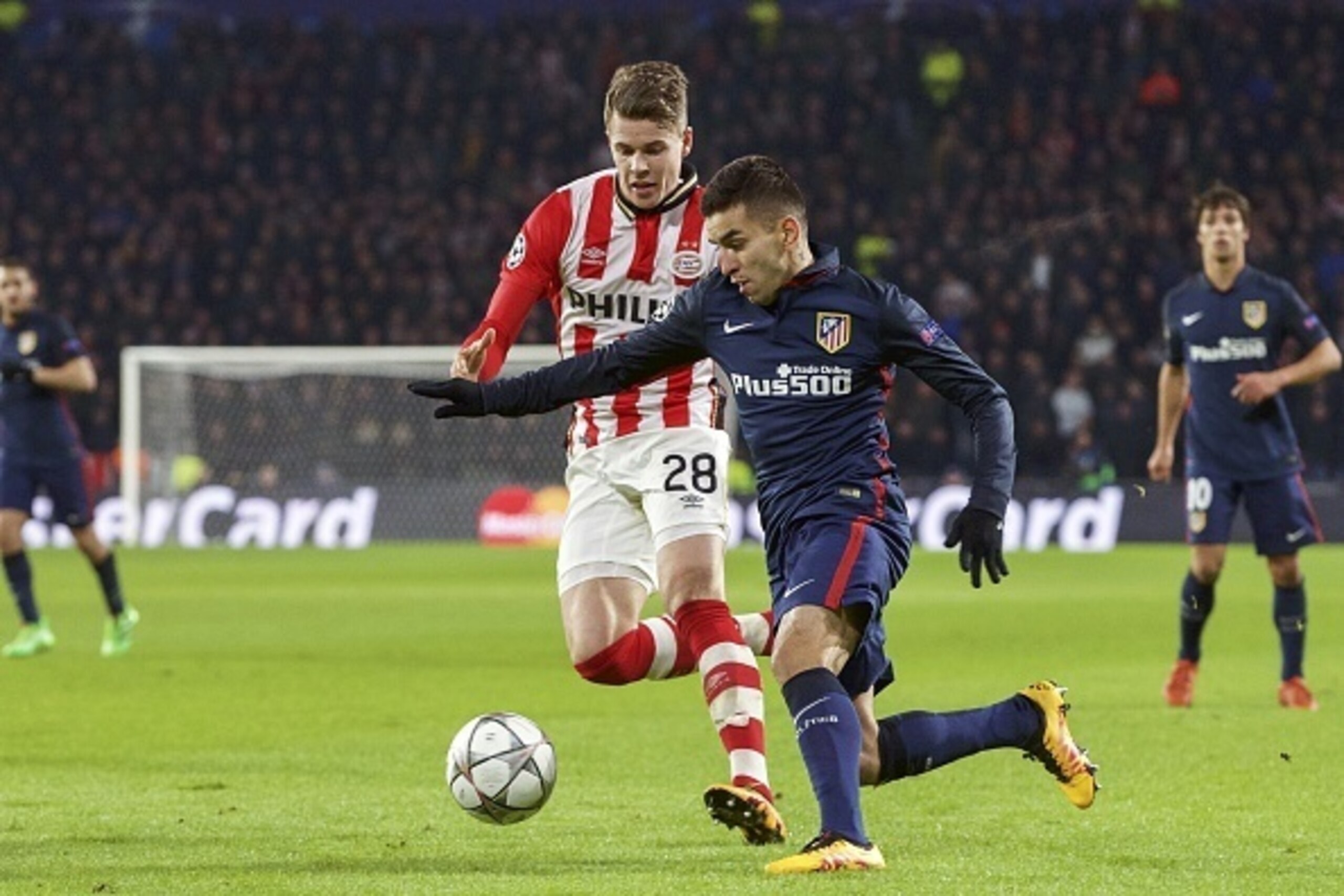 (L-R) Marco van Ginkel of PSV, Angel Correa of Club Atletico de Madrid during the UEFA Champions League Round of 16, First leg match between PSV Eindhoven and Atletico Madrid on February 24, 2016 at the Philips stadium in Eindhoven, The Netherlands.(Phot (L-R) Marco van Ginkel of PSV, Angel Correa of Club Atletico de Madrid during the UEFA Champions League Round of 16, First leg match between PSV Eindhoven and Atletico Madrid on February 24, 2016 at the Philips stadium in Eindhoven, The Netherlands.(Phot