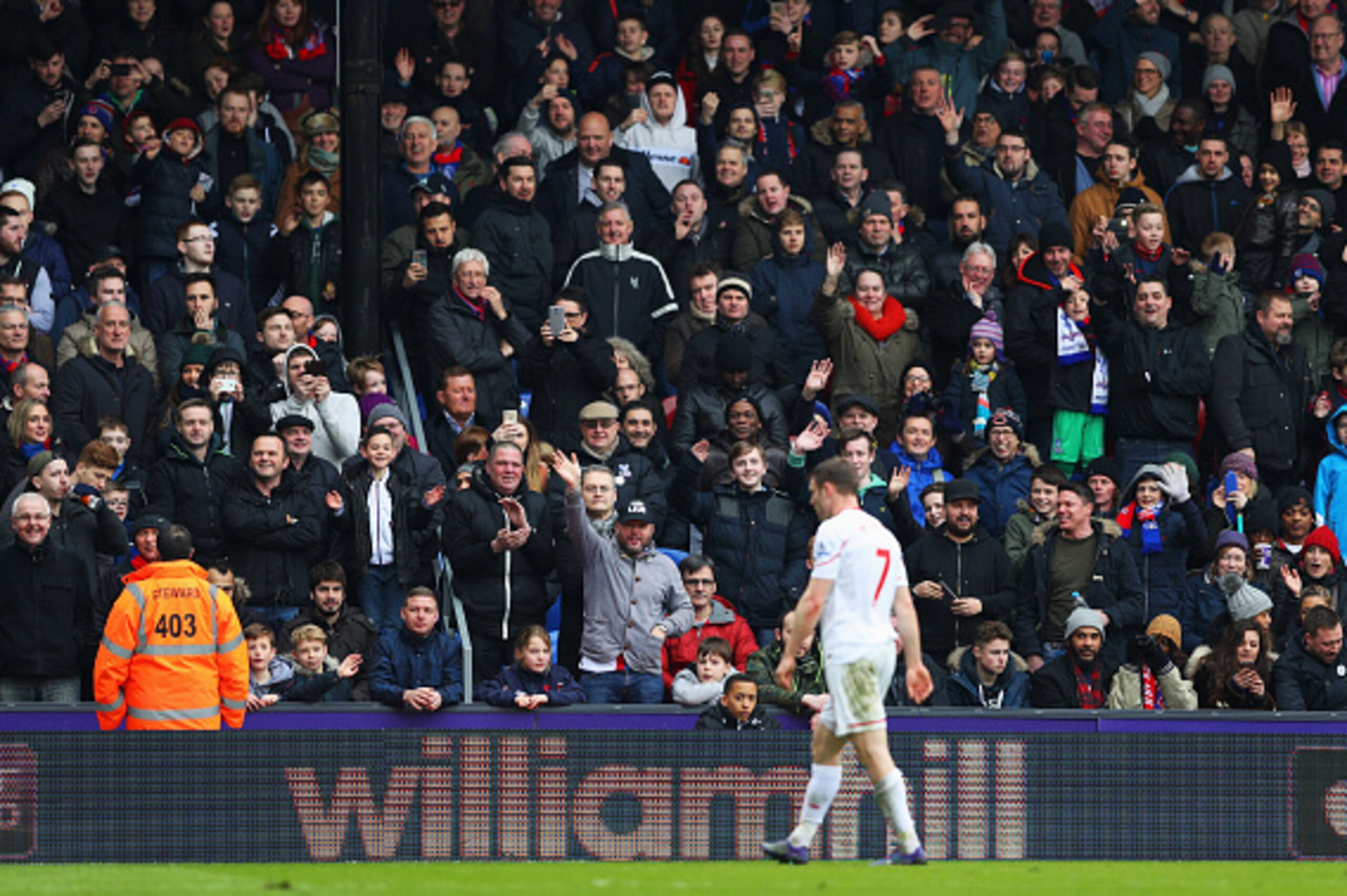 LONDON, ENGLAND - MARCH 06:  Fans wave at James Milner of Liverpool (7) as he is shown a second yellow card and is sent off during the Barclays Premier League match between Crystal Palace and Liverpool at Selhurst Park on March 6, 2016 in London, England.