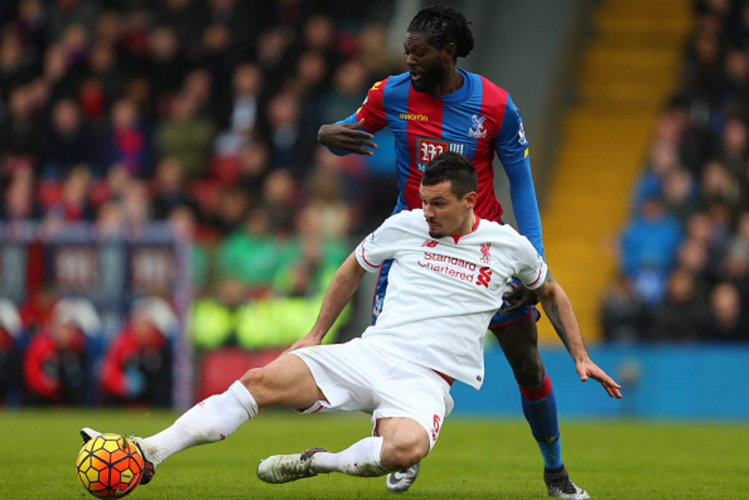 LONDON, ENGLAND - MARCH 06:  Emmanuel Adebayor of Crystal Palace and Dejan Lovren of Liverpool during the Barclays Premier League match between Crystal Palace and Liverpool at Selhurst Park on March 6, 2016 in London, England.  (Photo by Catherine Ivill -