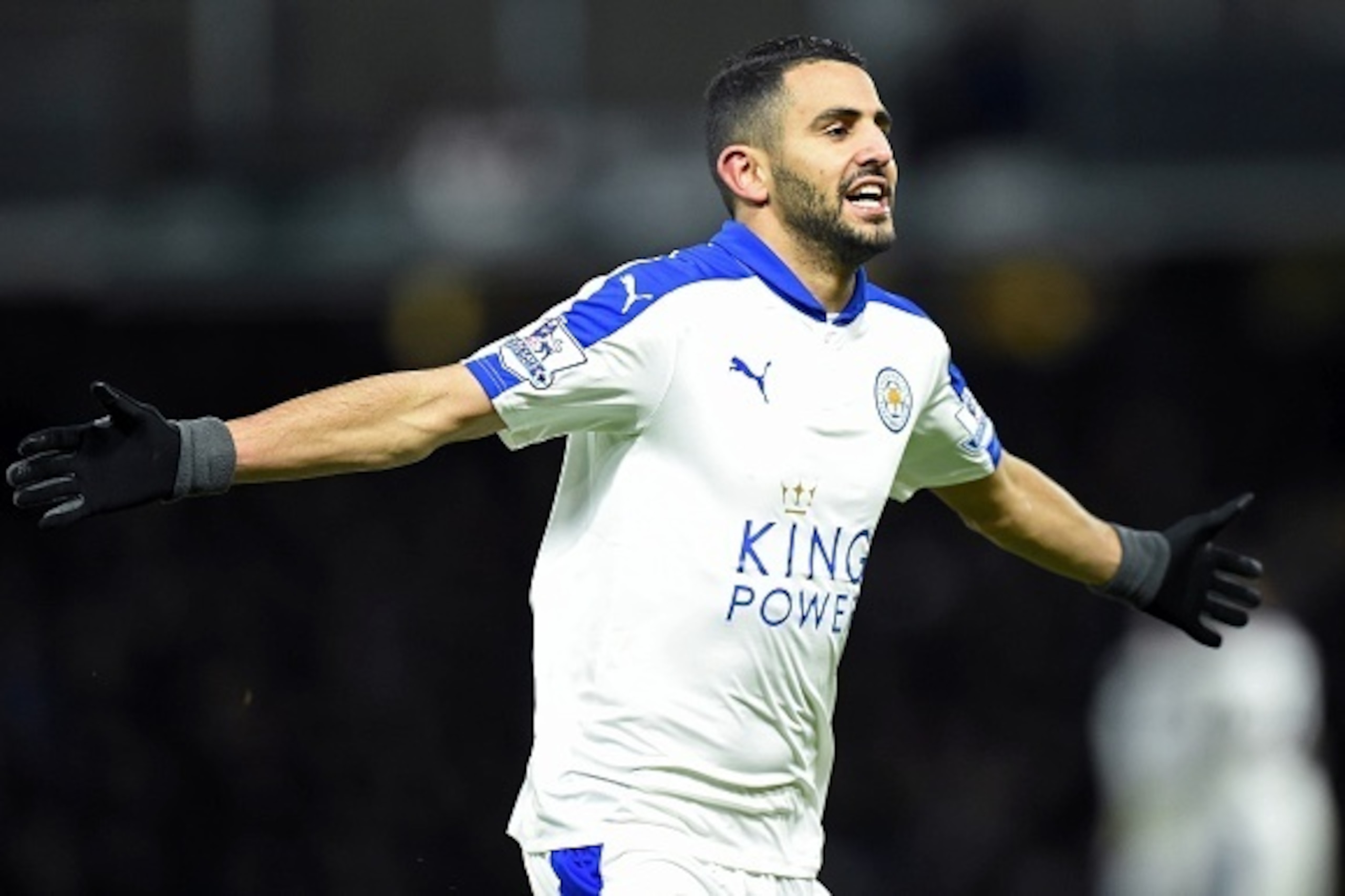 Leicester City's Algerian midfielder Riyad Mahrez celebrates scoring his team's first goal during the English Premier League football match between Watford and Leicester City at Vicarage Road Stadium in Watford, north of London on March 5, 2016. / AFP / O
