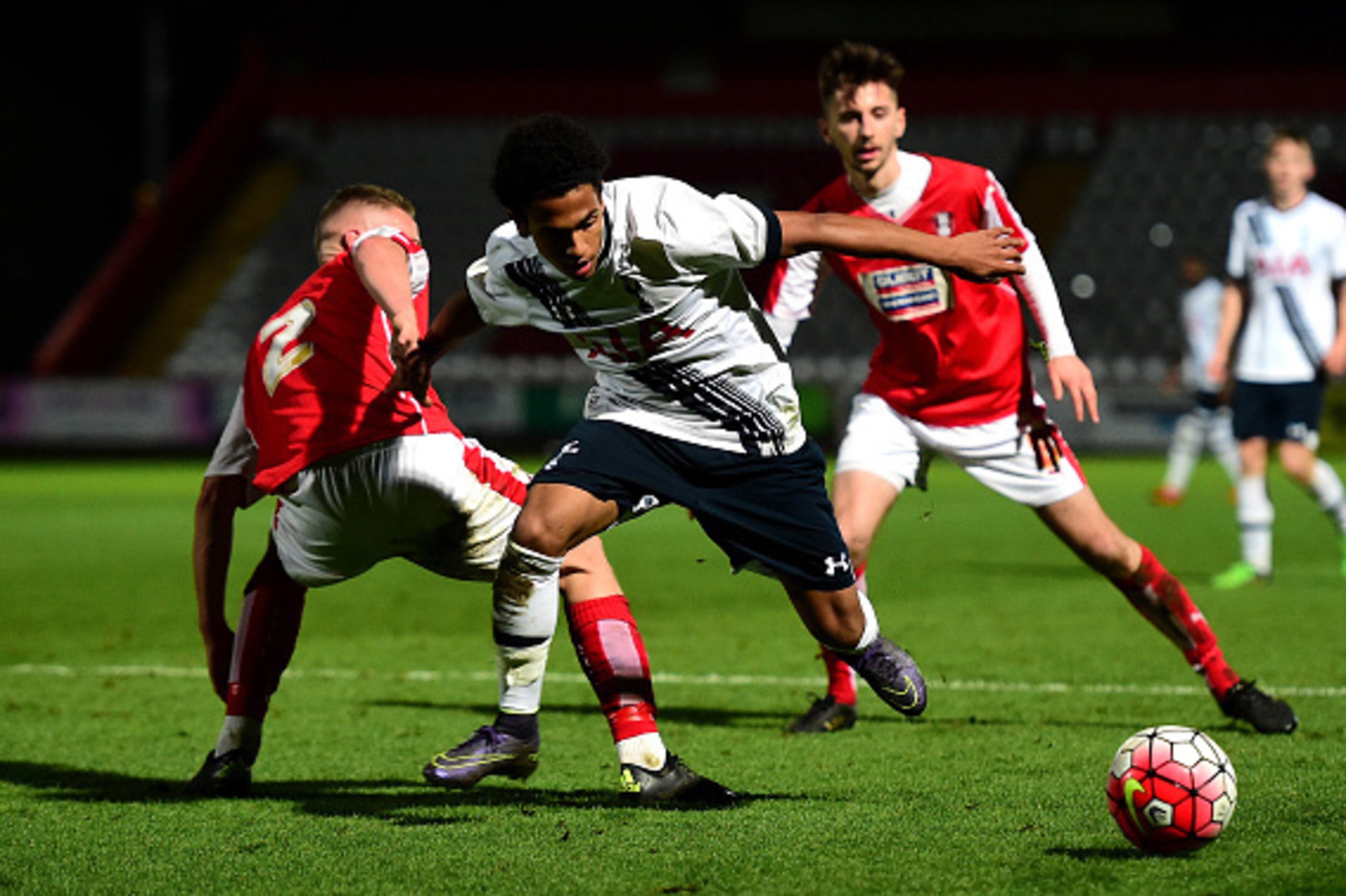 STEVENAGE, ENGLAND - DECEMBER 02:  Marcus Edwards of Tottenham Hotspur takes on Fabian Bailey of Rotherham United during the FA Youth Cup match between Tottenham Hotspur and Rotherham United at The Lamex Stadium on December 2, 2015 in Stevenage, England. 