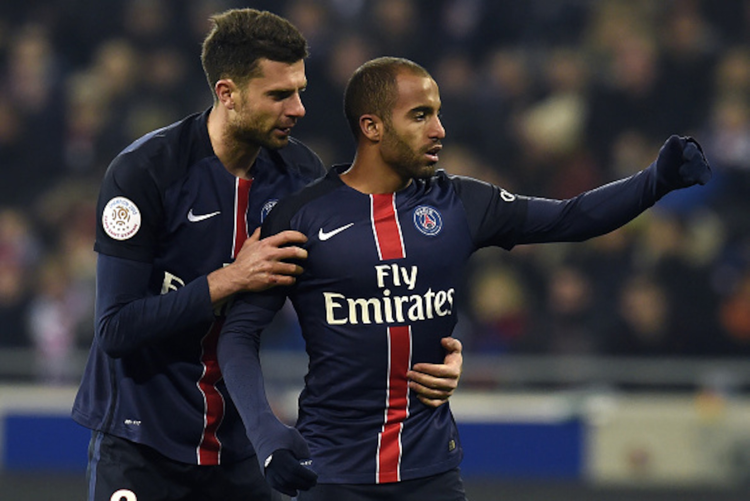 Paris Saint-Germain's Brazilian midfielder Lucas Moura (R) is congratuled by teamate Paris Saint-Germain's Italian midfielder Thiago Motta (L) after scoring during the French Ligue1 football match between Olympique Lyonnais and Paris Saint-Germain, on Feb Paris Saint-Germain's Brazilian midfielder Lucas Moura (R) is congratuled by teamate Paris Saint-Germain's Italian midfielder Thiago Motta (L) after scoring during the French Ligue1 football match between Olympique Lyonnais and Paris Saint-Germain, on Feb