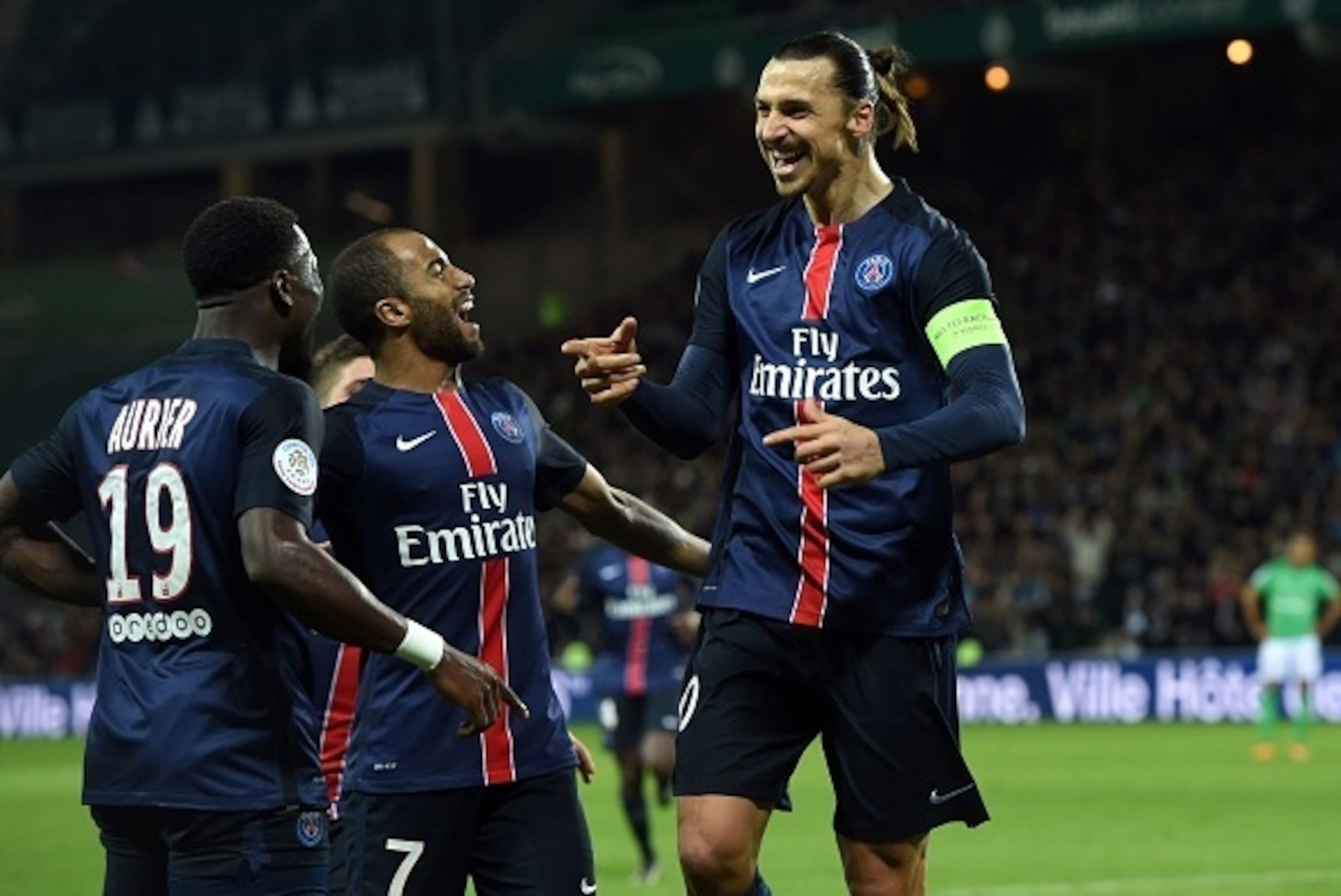 Paris Saint-Germain's Swedish forward Zlatan Ibrahimovic (R) celebrates withParis Saint-Germain's French midfielder Serge Airier (L) and Paris Saint-Germain's Brazilian midfielder Lucas (C) after scoring a goal during the Ligue1 football match between AS Paris Saint-Germain's Swedish forward Zlatan Ibrahimovic (R) celebrates withParis Saint-Germain's French midfielder Serge Airier (L) and Paris Saint-Germain's Brazilian midfielder Lucas (C) after scoring a goal during the Ligue1 football match between AS