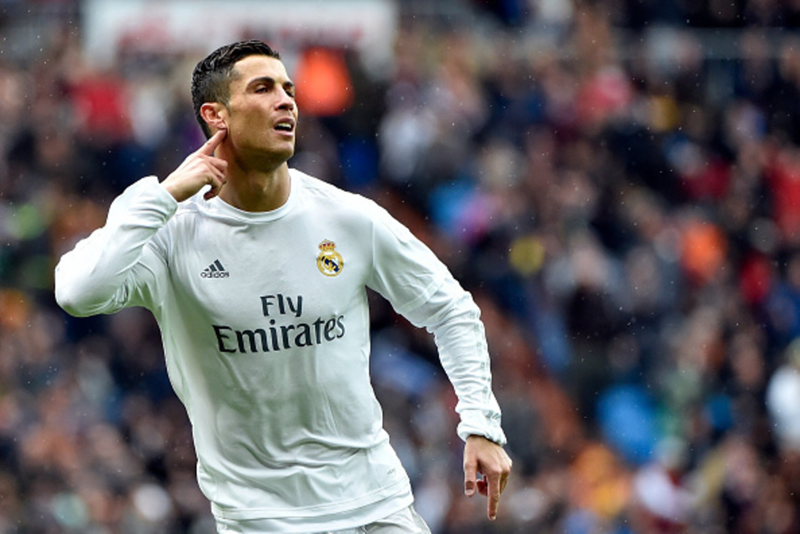 Real Madrid's Portuguese forward Cristiano Ronaldo gestures as he celebrates a goal during the Spanish league football match Real Madrid CF vs RC Celta de Vigo at the Santiago Bernabeu stadium in Madrid on March 5, 2016. / AFP / GERARD JULIEN (Phot Real Madrid's Portuguese forward Cristiano Ronaldo gestures as he celebrates a goal during the Spanish league football match Real Madrid CF vs RC Celta de Vigo at the Santiago Bernabeu stadium in Madrid on March 5, 2016. / AFP / GERARD JULIEN (Phot