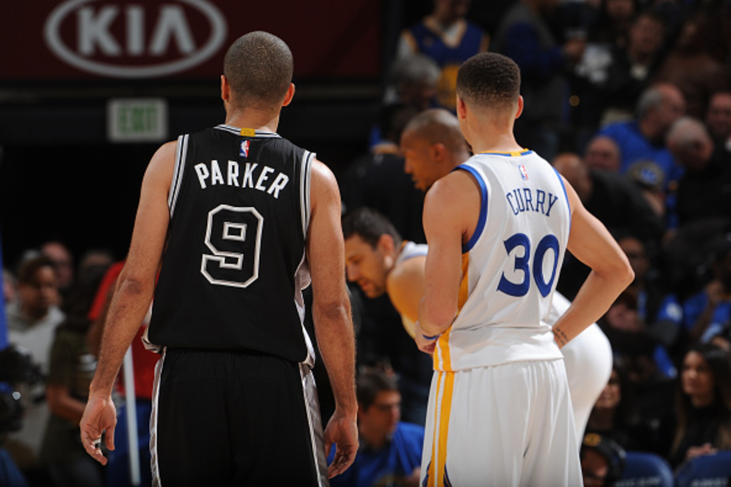 OAKLAND, CA - JANUARY 25: Tony Parker #9 of the San Antonio Spurs and Stephen Curry #30 of the Golden State Warriors on January 25, 2016 at Oracle Arena in Oakland, California. NOTE TO USER: User expressly acknowledges and agrees that, by downloading and 