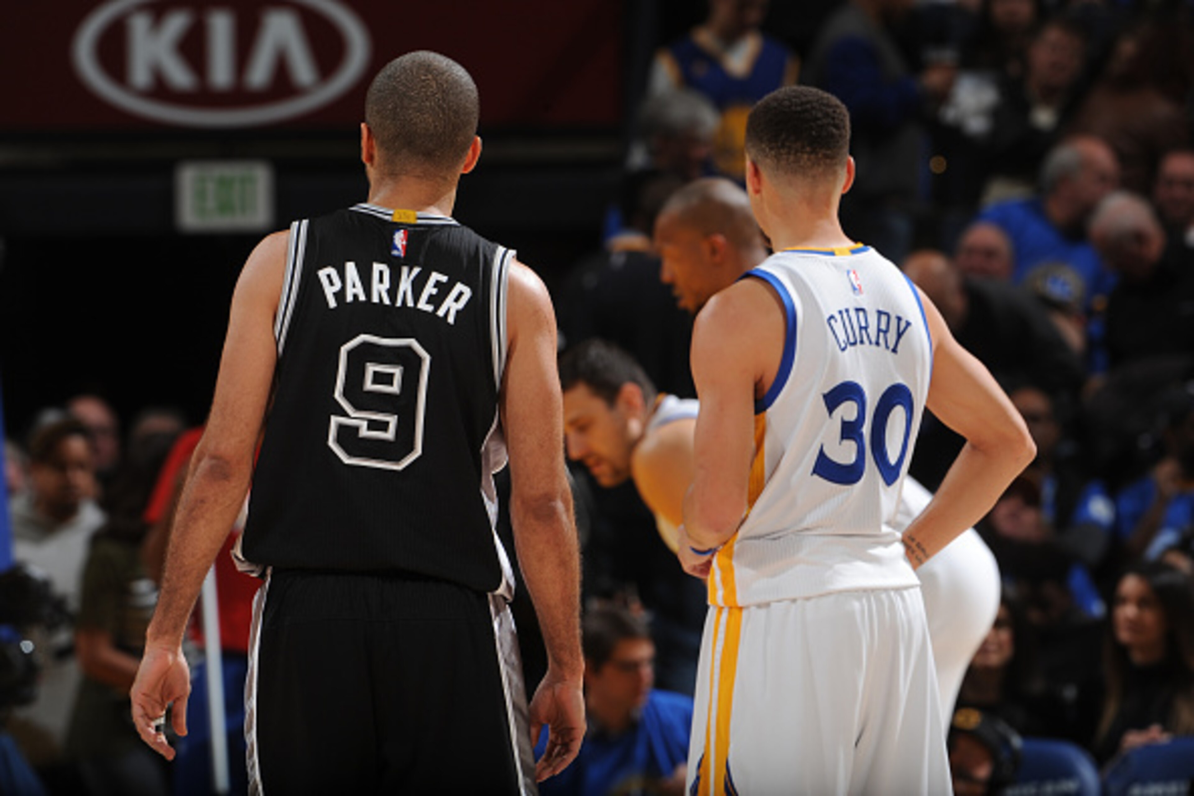 OAKLAND, CA - JANUARY 25: Tony Parker #9 of the San Antonio Spurs and Stephen Curry #30 of the Golden State Warriors on January 25, 2016 at Oracle Arena in Oakland, California. NOTE TO USER: User expressly acknowledges and agrees that, by downloading and 