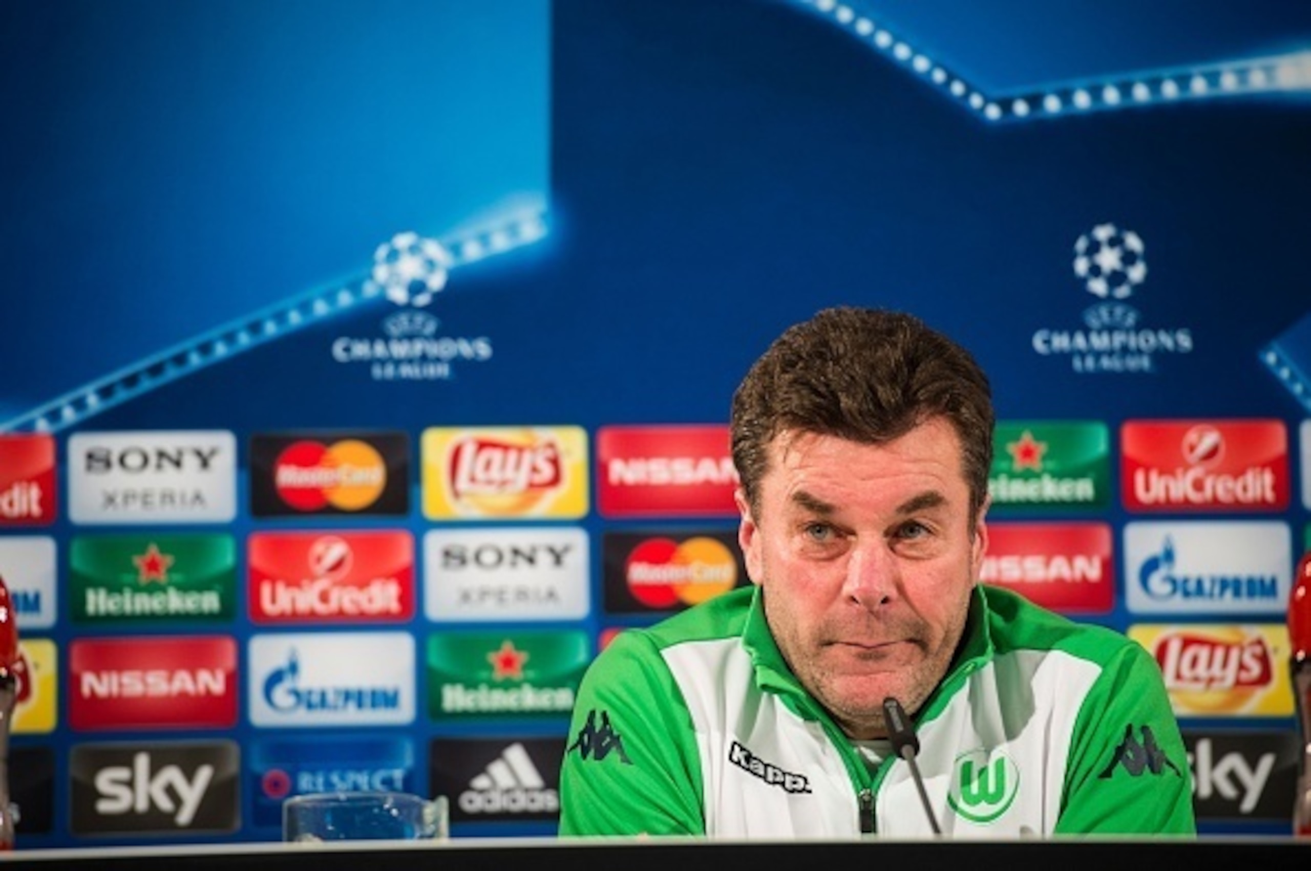Wolfsburg's head coach Dieter Hecking attends a press conference on the eve of the second-leg round of 16 UEFA Champions league football match between VfL Wolfsburg and KAA Gent at the Volkswagen arena in Wolfsburg on March 7, 2016.   

 / AFP / ODD ANDER