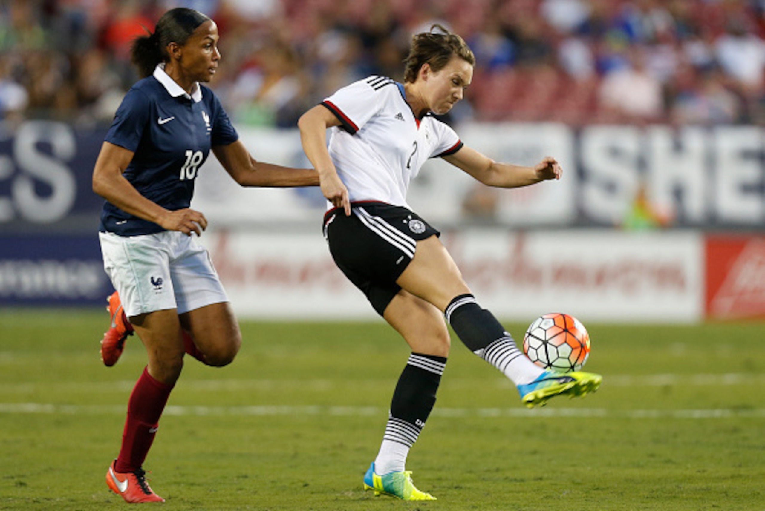 TAMPA, FL - MARCH 3:  Defender Josephine Henning  #2 of Germany controls the ball ahead forward Marie-Laure Delie #18 of France during the second half of the 2016 SheBelieves Cup soccer match on March 3, 2016 at Raymond James Stadium in Tampa, Florida.  (