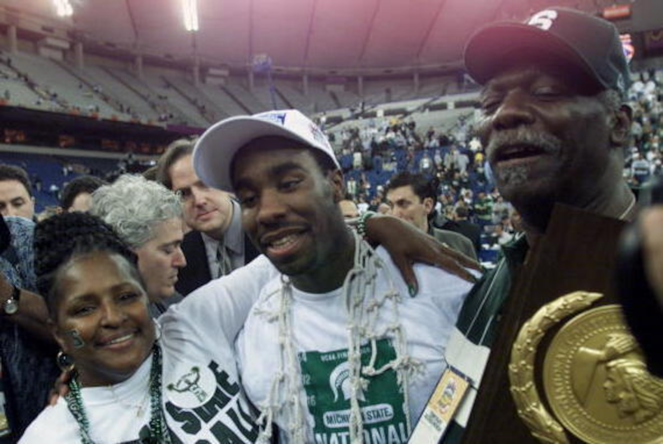 3 Apr 2000: Mateen Cleaves #12 of Michigan State gets a hug from his mother Francis and father Herbert after defeating Florida 89-76 to win the final round of the NCAA Men''s Final Four at the RCA Dome in Indianapolis, Indiana.