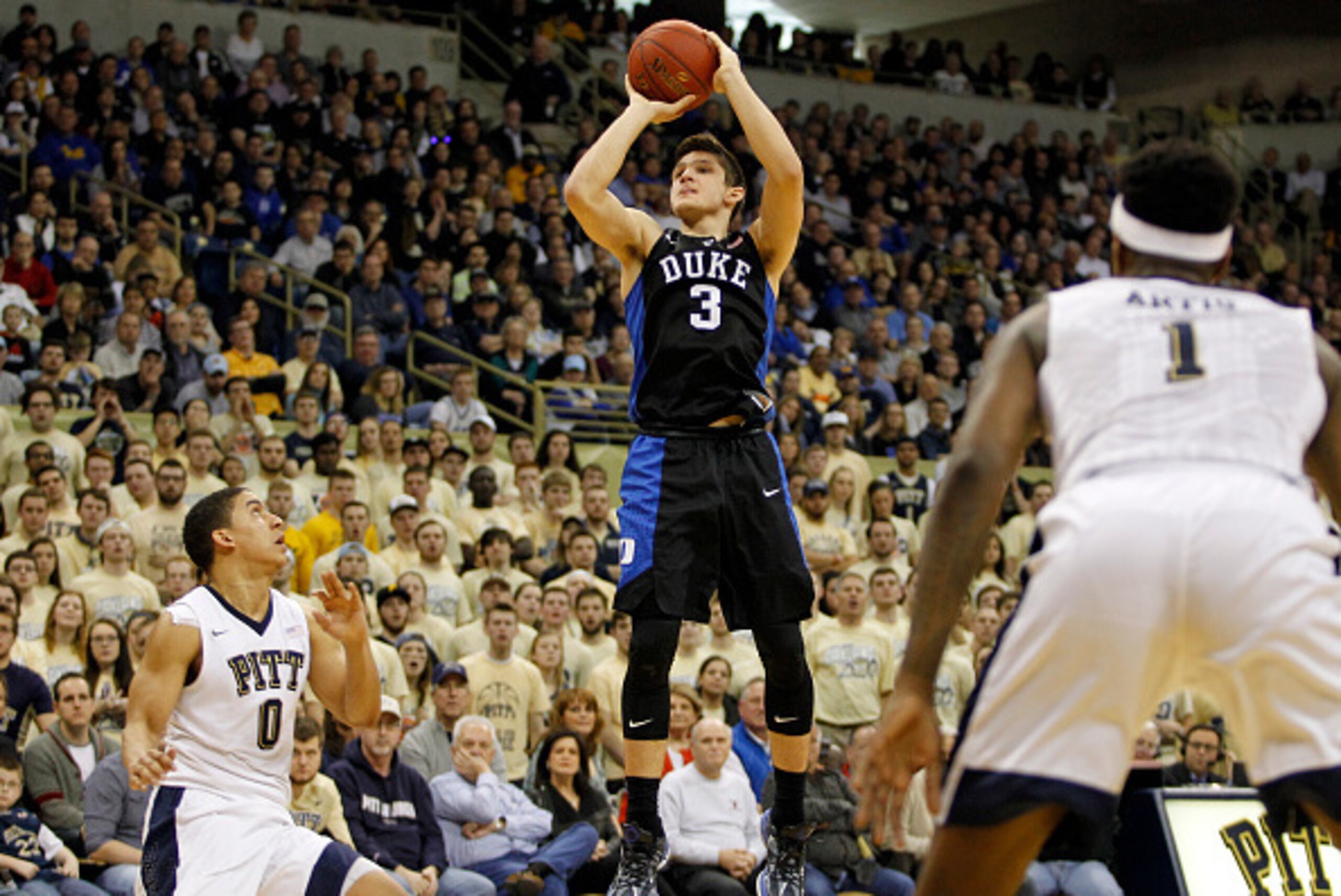 PITTSBURGH, PA - FEBRUARY 28: Grayson Allen #3 of the Duke Blue Devils pulls up for a three against James Robinson #0 of the Pittsburgh Panthers during the game at Petersen Events Center on February 28, 2016 in Pittsburgh, Pennsylvania. (Photo by Justin K
