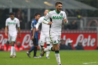 MILAN, ITALY - JANUARY 10:  Domenico Berardi of US Sassuolo Calcio celebrates after scoring the opening goal during the Serie A match between FC Internazionale Milano and US Sassuolo Calcio at Stadio Giuseppe Meazza on January 10, 2016 in Milan, Italy.  (