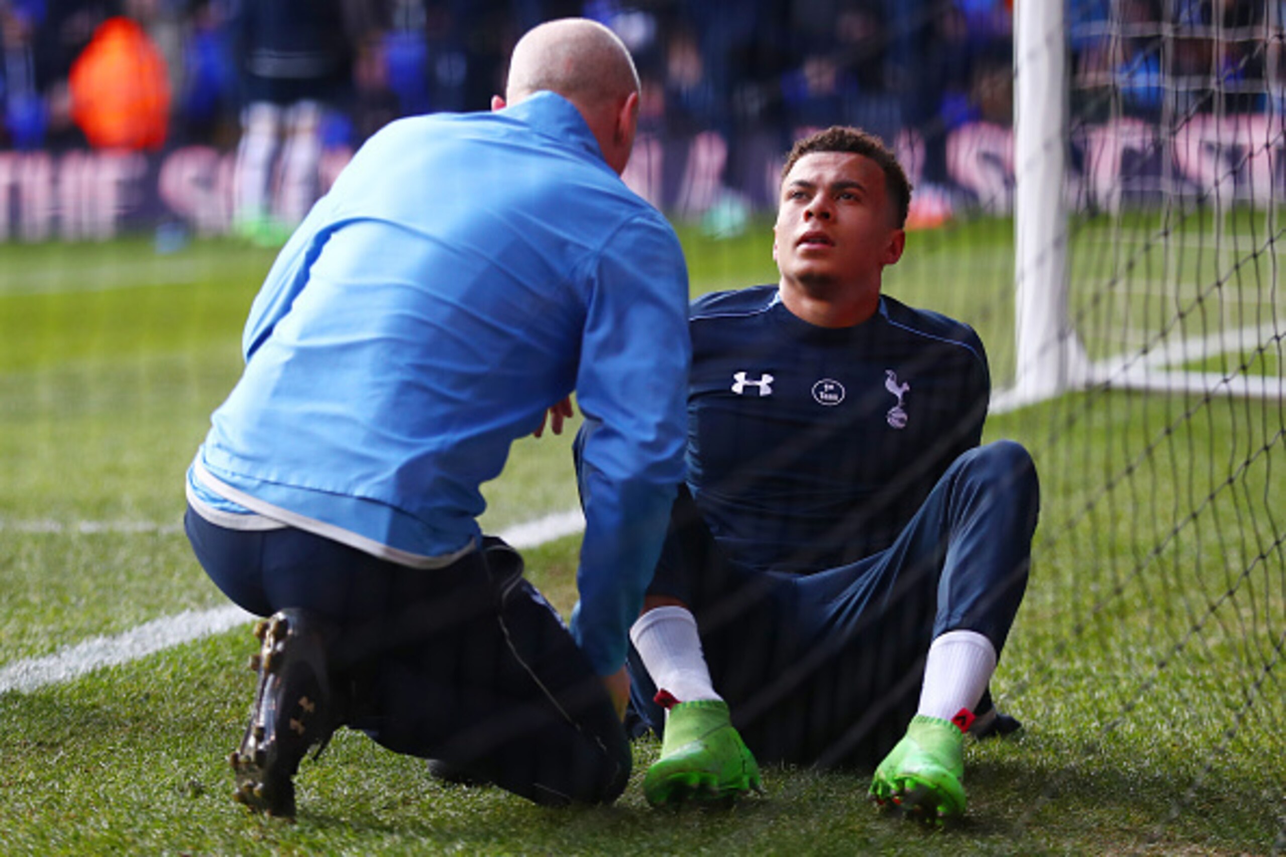 LONDON, ENGLAND - FEBRUARY 28:  Dele Alli of Tottenham Hotspur receives treatment in the warm up prior to the Barclays Premier League match between Tottenham Hotspur and Swansea City at White Hart Lane on February 28, 2016 in London, England.  (Photo by C