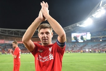 Former Liverpool football star Steven Gerrard applauds the fans after playing for Liverpool Legends against Australian Legends in an exhibition football game at the ANZ Stadium in Sydney on January 7, 2016. AFP PHOTO / Peter PARKS    IMAGE STRICTLY FOR ED