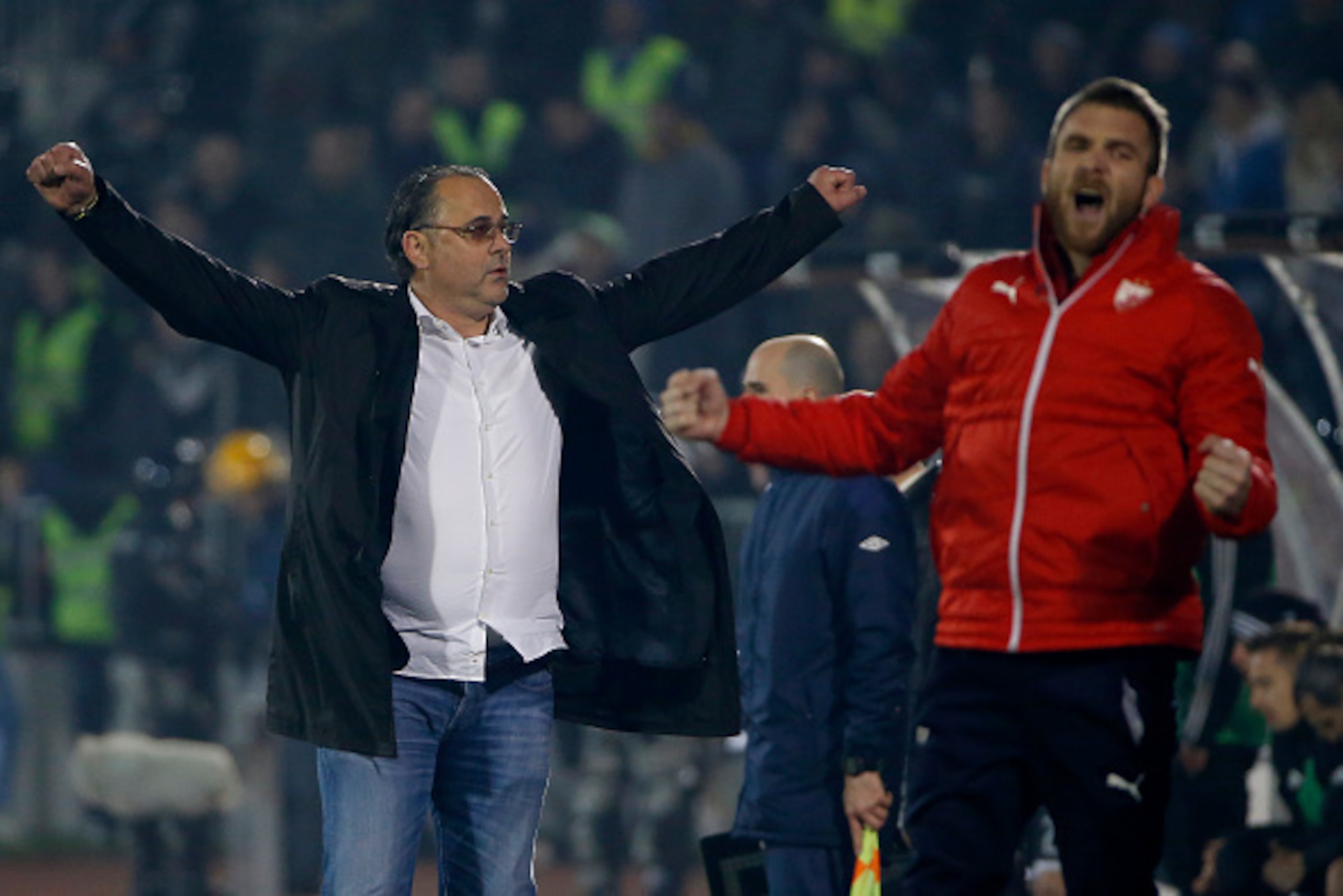 BELGRADE, SERBIA - FEBRUARY 27 : Head coach Miodrag Bozovic (L) and Aleksandar Katai (R) of FK Crvena Zvezda celebrate victory after the Serbian Super League match between FK Partizan and FK Crvena Zvezda at Stadium FK Partizan on February 27, 2016 in Bel BELGRADE, SERBIA - FEBRUARY 27 : Head coach Miodrag Bozovic (L) and Aleksandar Katai (R) of FK Crvena Zvezda celebrate victory after the Serbian Super League match between FK Partizan and FK Crvena Zvezda at Stadium FK Partizan on February 27, 2016 in Bel