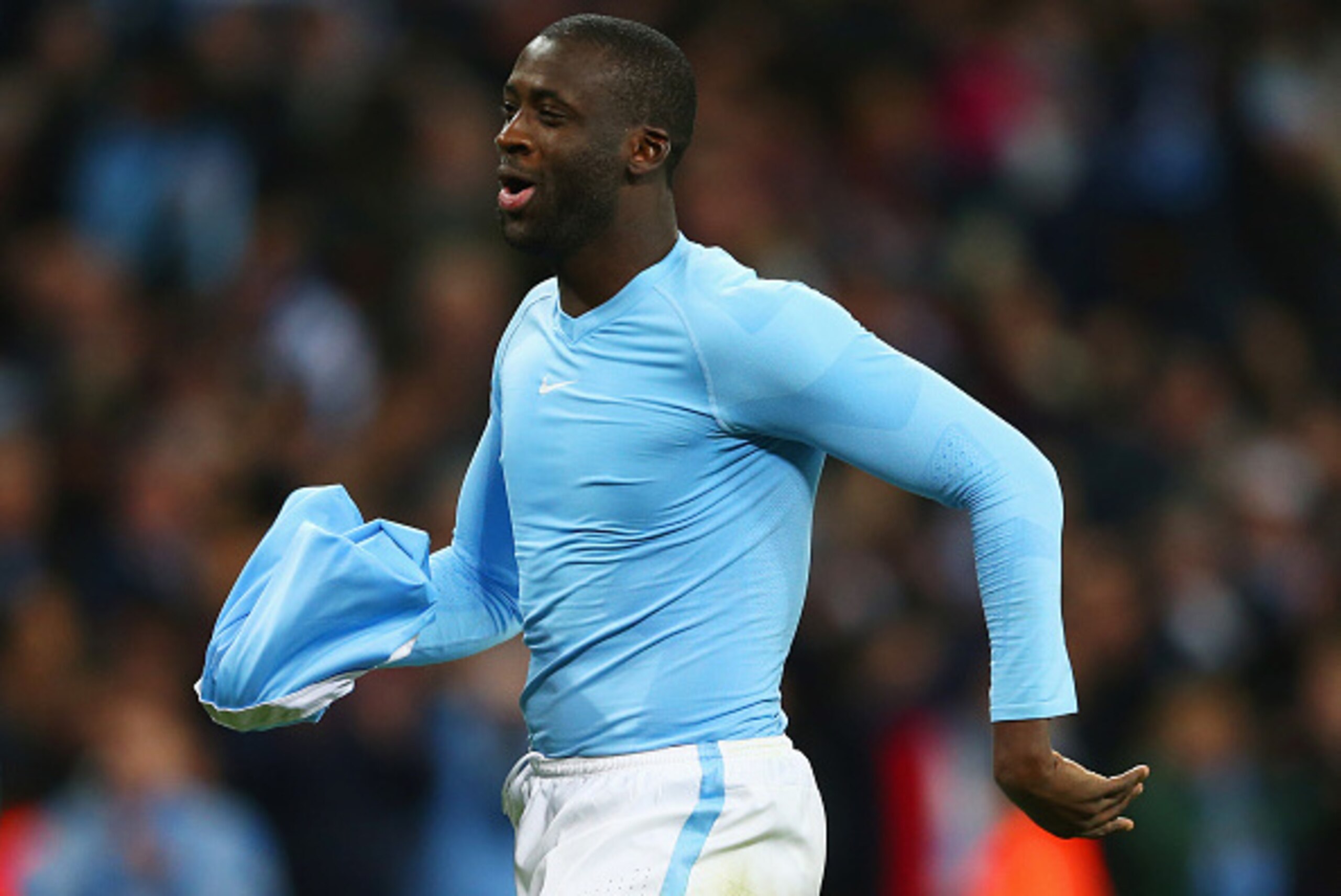 LONDON, ENGLAND - FEBRUARY 28:  Yaya Toure of Manchester City celebrates as he scores the winning penalty to win the shoot out during the Capital One Cup Final match between Liverpool and Manchester City at Wembley Stadium on February 28, 2016 in London, 